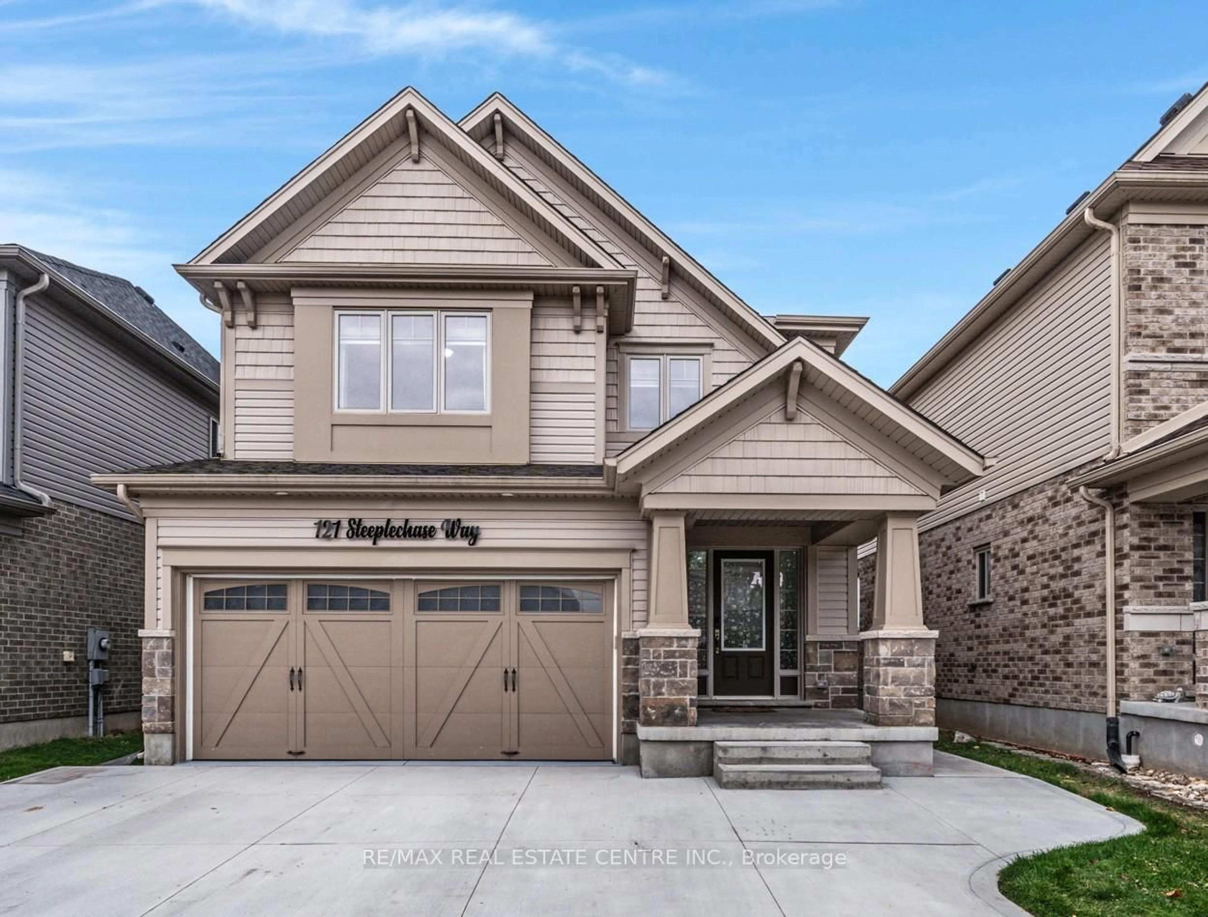 Home with brick exterior material, street for 121 Steeplechase Way, Waterloo Ontario N2K 0E7