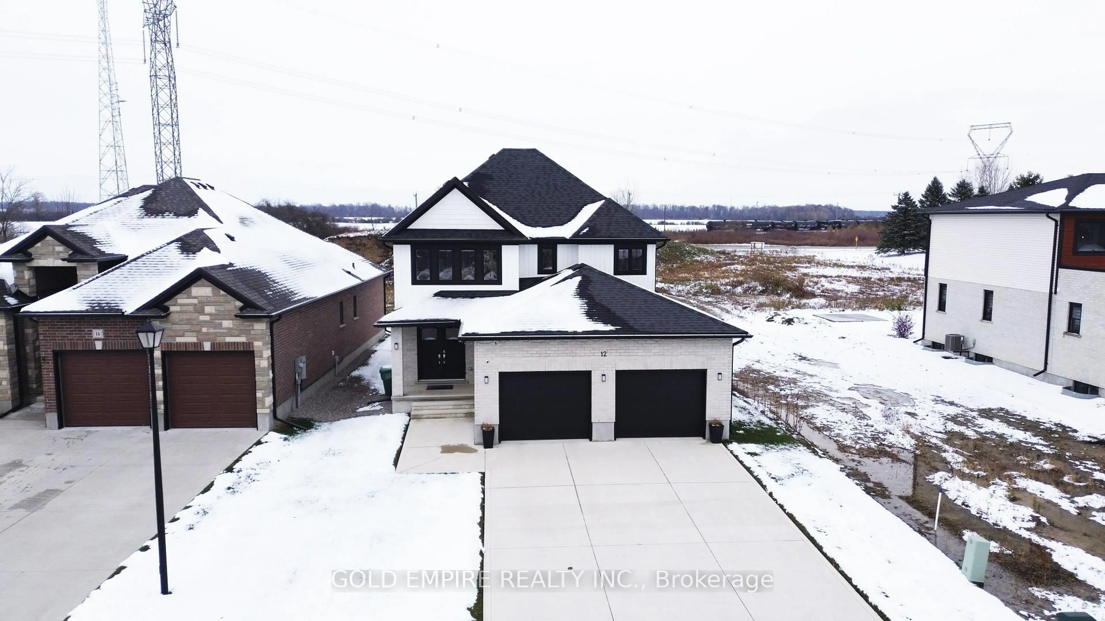 A pic from outside/outdoor area/front of a property/back of a property/a pic from drone, street for 12 REA Crt, Southwold Ontario N6L 1M1