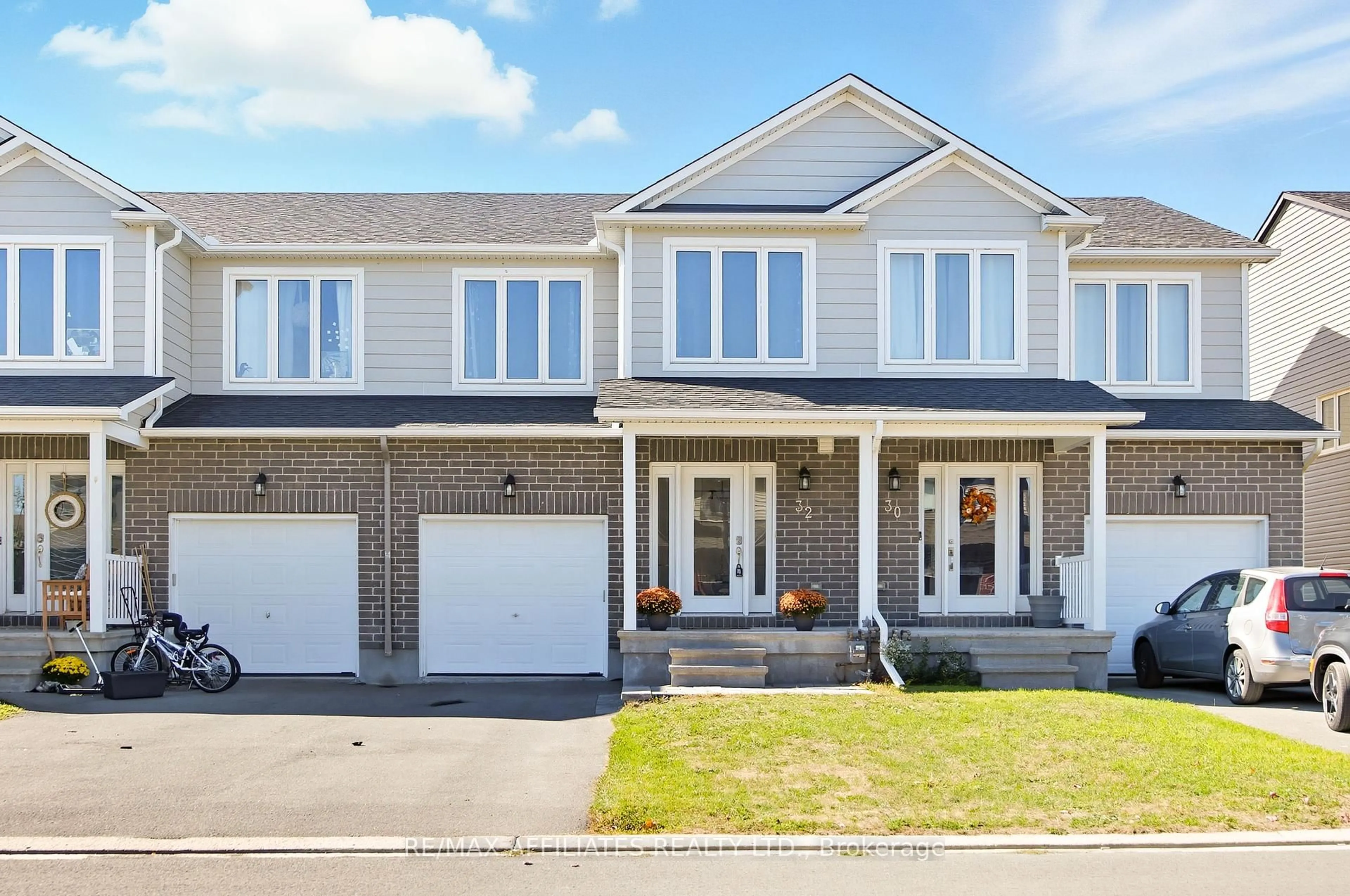 Home with brick exterior material, street for 32 Code Cres, Carleton Place Ontario K7C 4J7