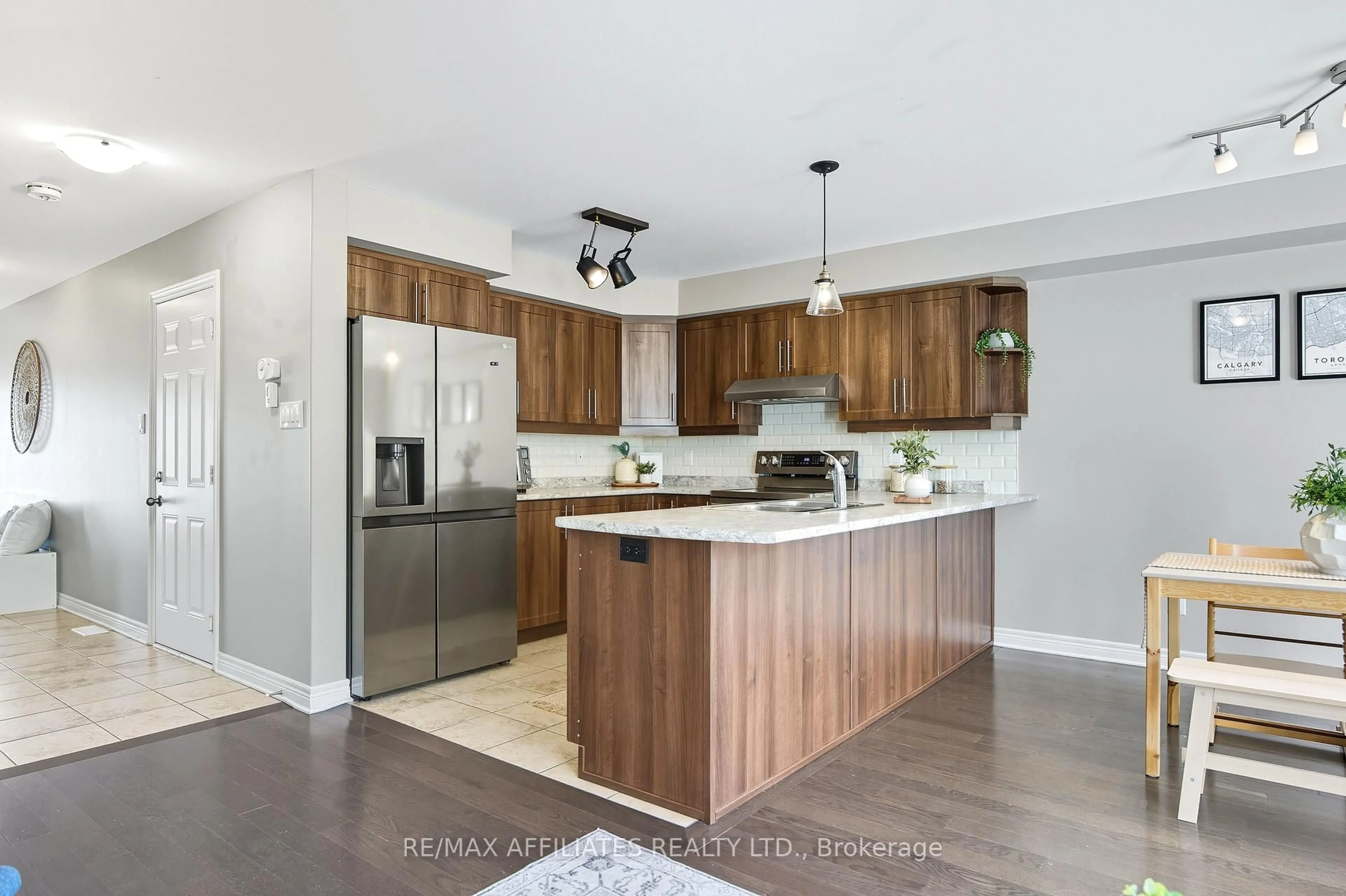 Open concept kitchen, wood/laminate floor for 32 Code Cres, Carleton Place Ontario K7C 4J7