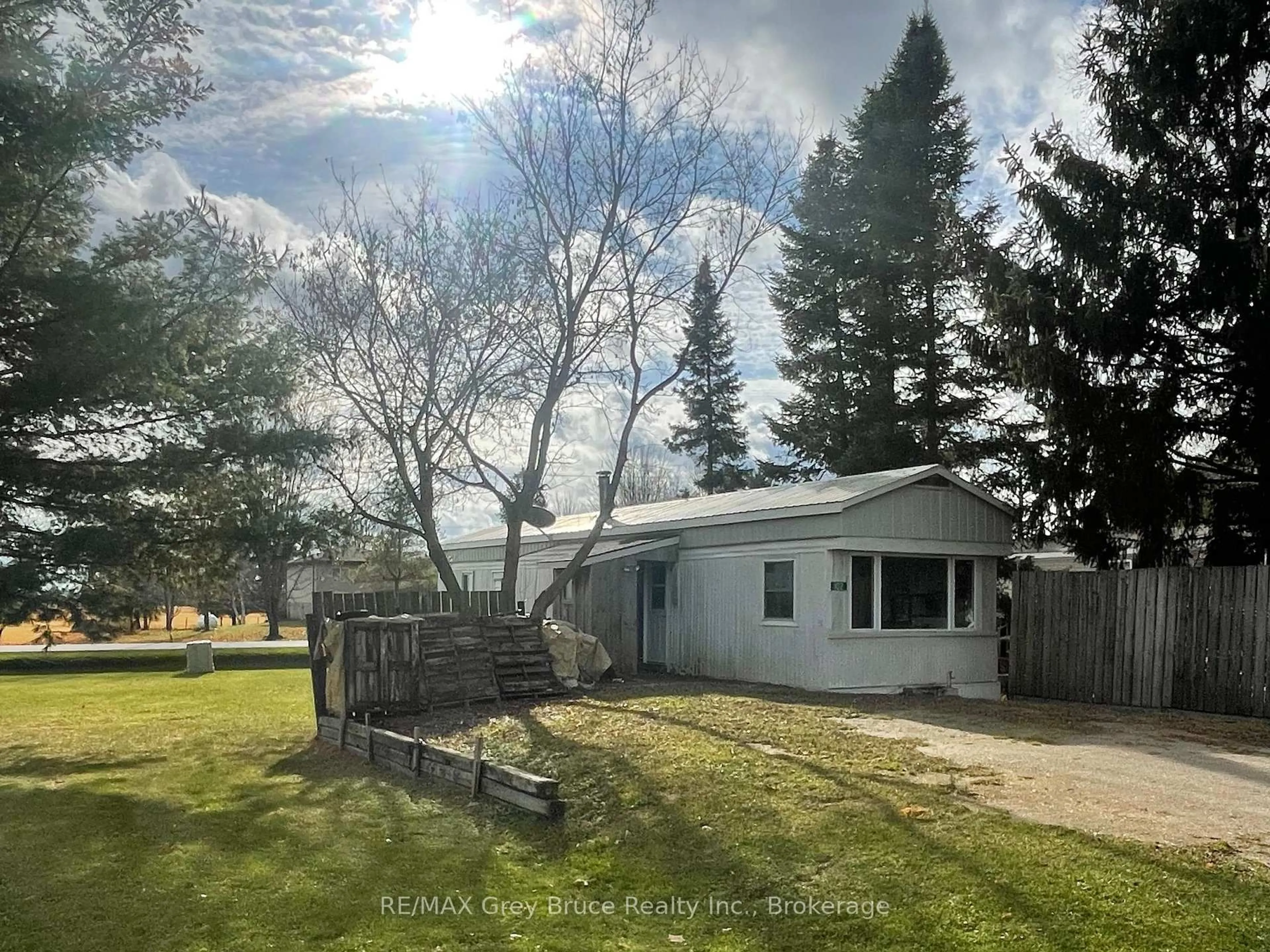 A pic from outside/outdoor area/front of a property/back of a property/a pic from drone, unknown for 102 Grace St, Georgian Bluffs Ontario N0H 2N0