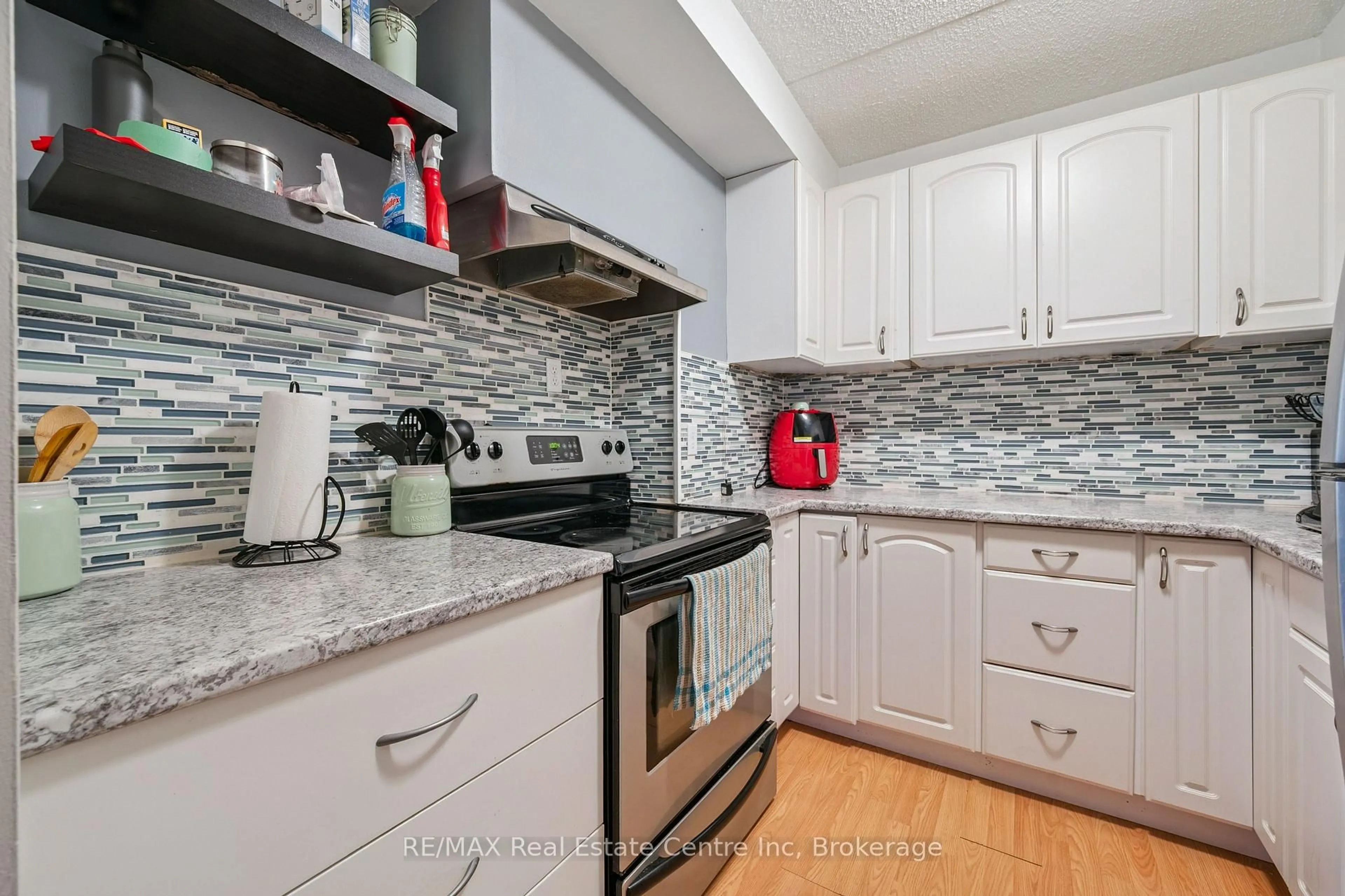 Standard kitchen, ceramic/tile floor for 65 Silvercreek Pkwy #310, Guelph Ontario N1H 7R9