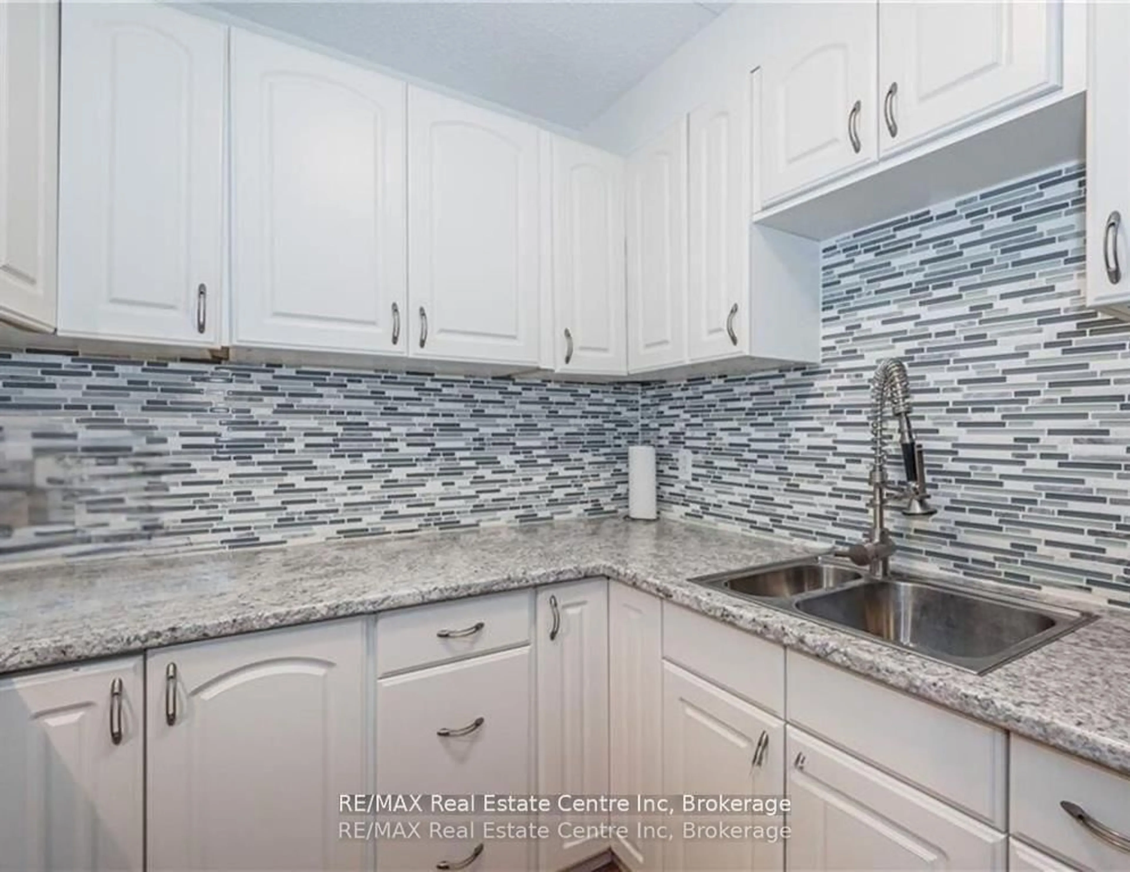 Standard kitchen, ceramic/tile floor for 65 Silvercreek Pkwy #310, Guelph Ontario N1H 7R9