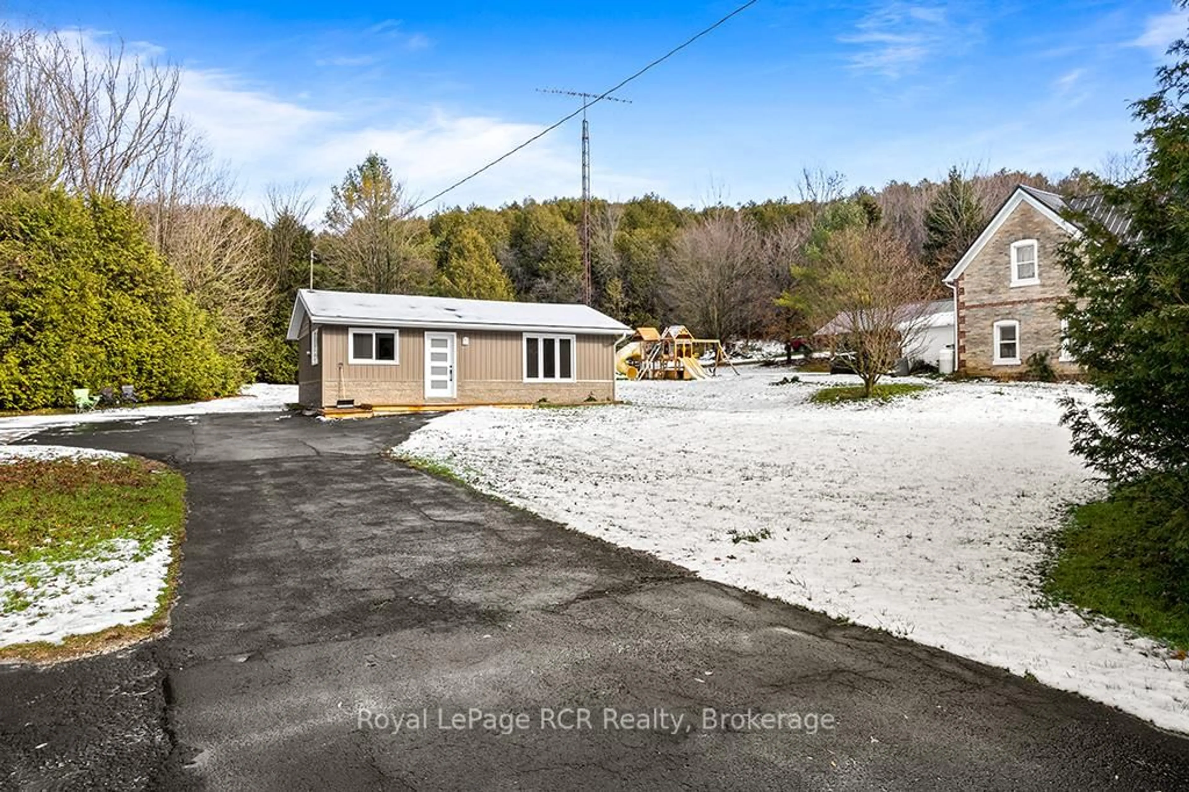 A pic from outside/outdoor area/front of a property/back of a property/a pic from drone, water/lake/river/ocean view for 405009 Grey 4 Rd, Grey Highlands Ontario N0C 1K0
