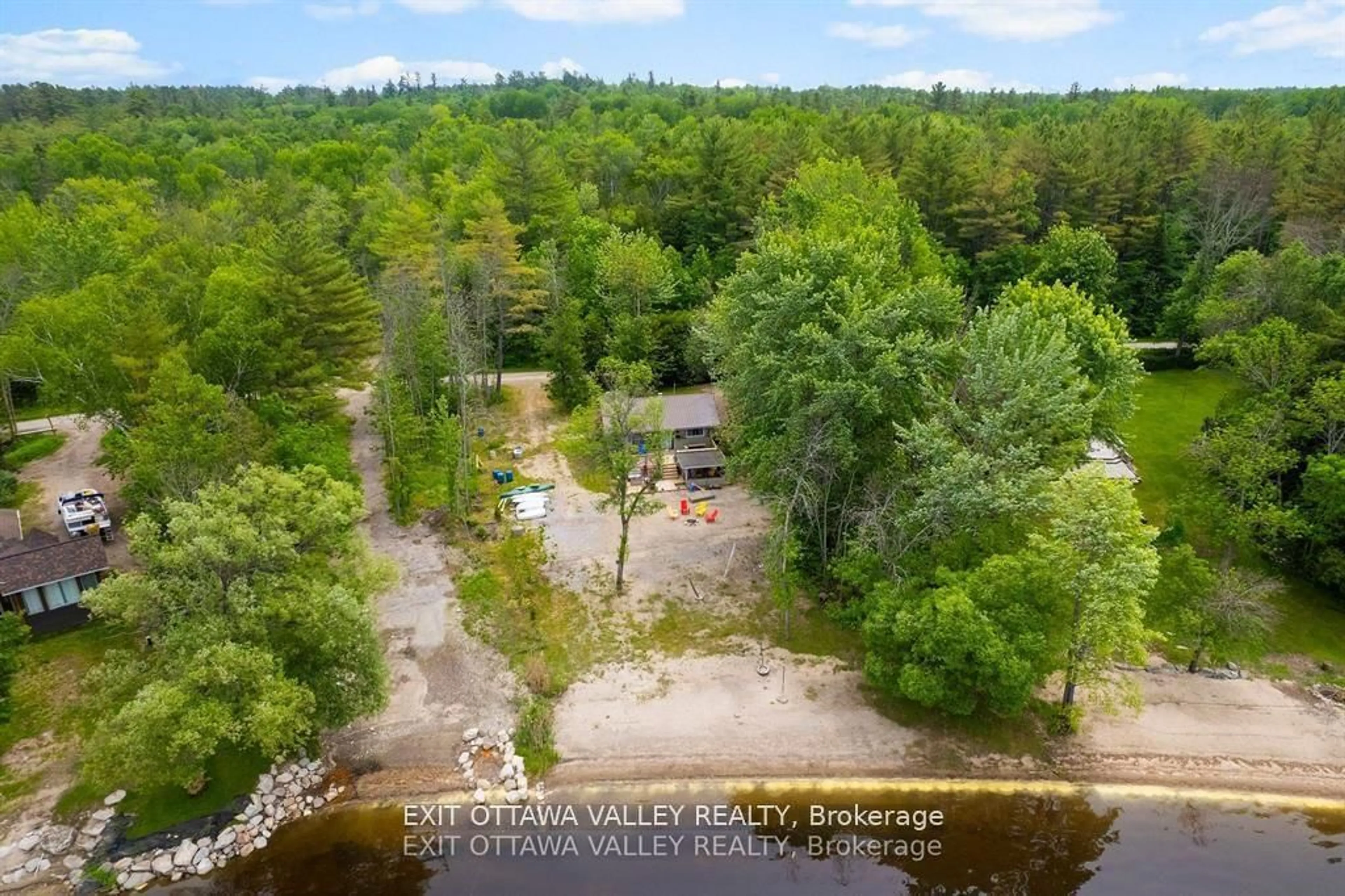 A pic from outside/outdoor area/front of a property/back of a property/a pic from drone, water/lake/river/ocean view for 303 Gervais Rd, Westmeath Ontario K0J 2L0