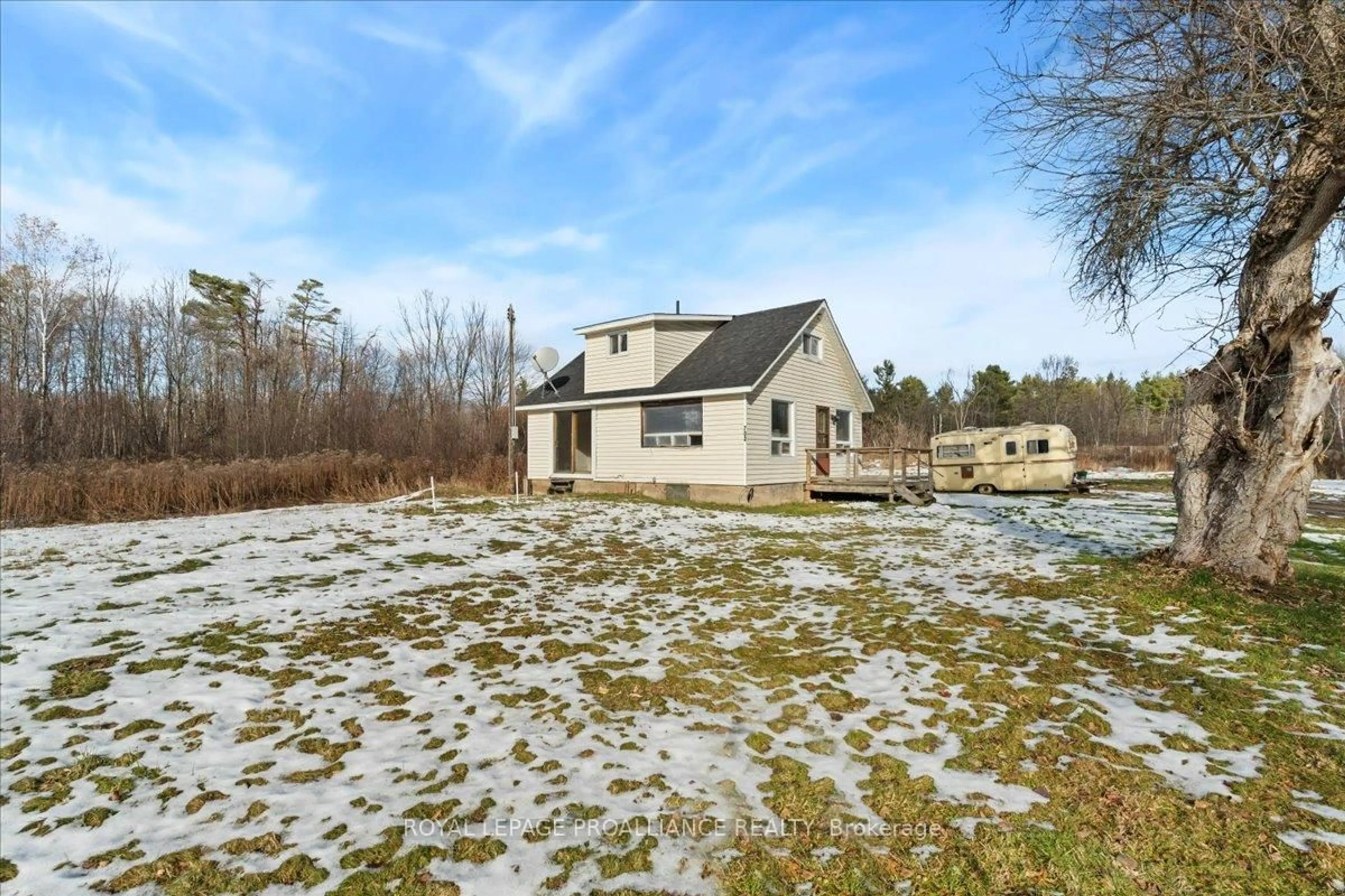 A pic from outside/outdoor area/front of a property/back of a property/a pic from drone, water/lake/river/ocean view for 702 French Settlement Rd, Tweed Ontario K0K 3J0