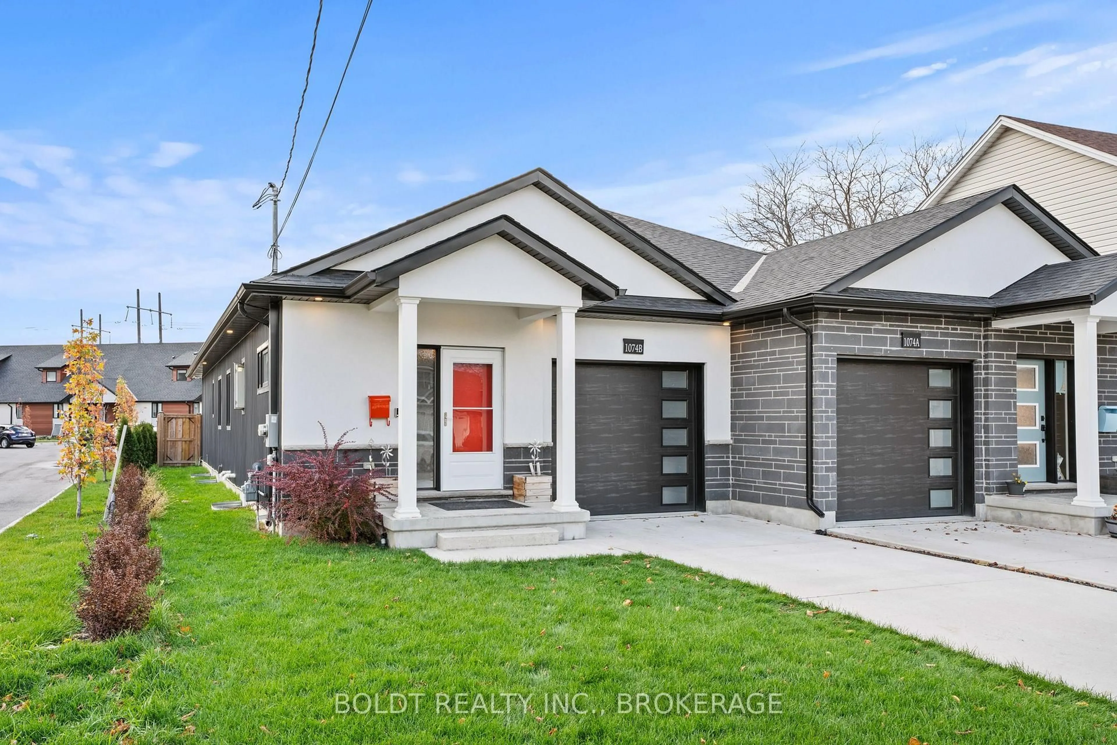 Home with brick exterior material, street for 1074B Vansickle Rd, St. Catharines Ontario L2S 2X3