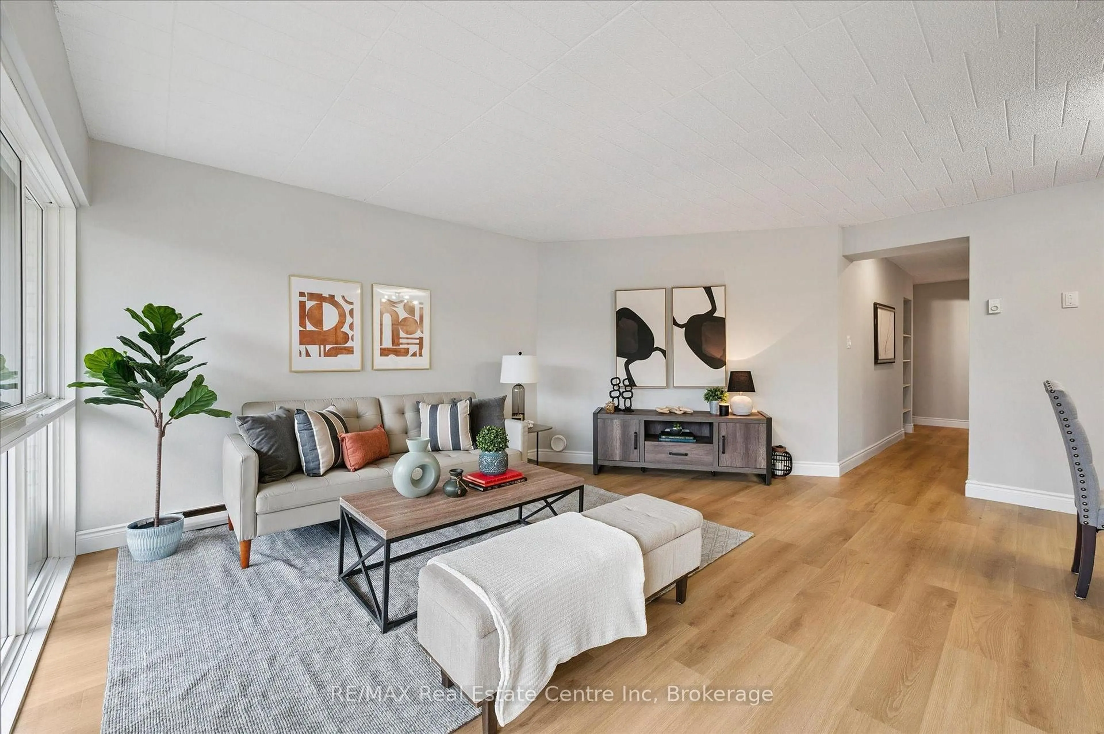 Living room with furniture, unknown for 105 CONROY Cres #102, Guelph Ontario N1G 2V5