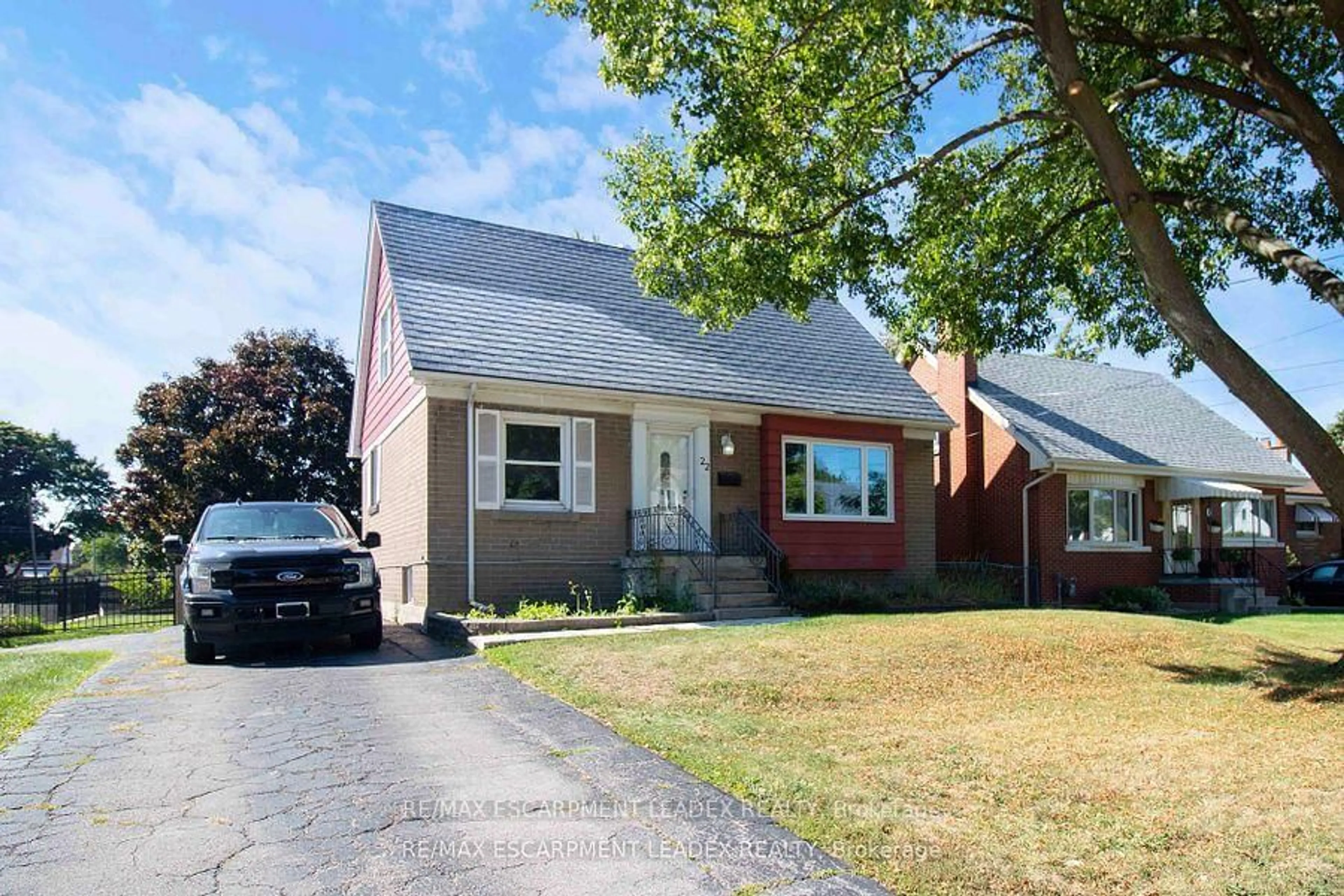 Home with vinyl exterior material, street for 22 Nancy St, Hamilton Ontario L8T 3L8