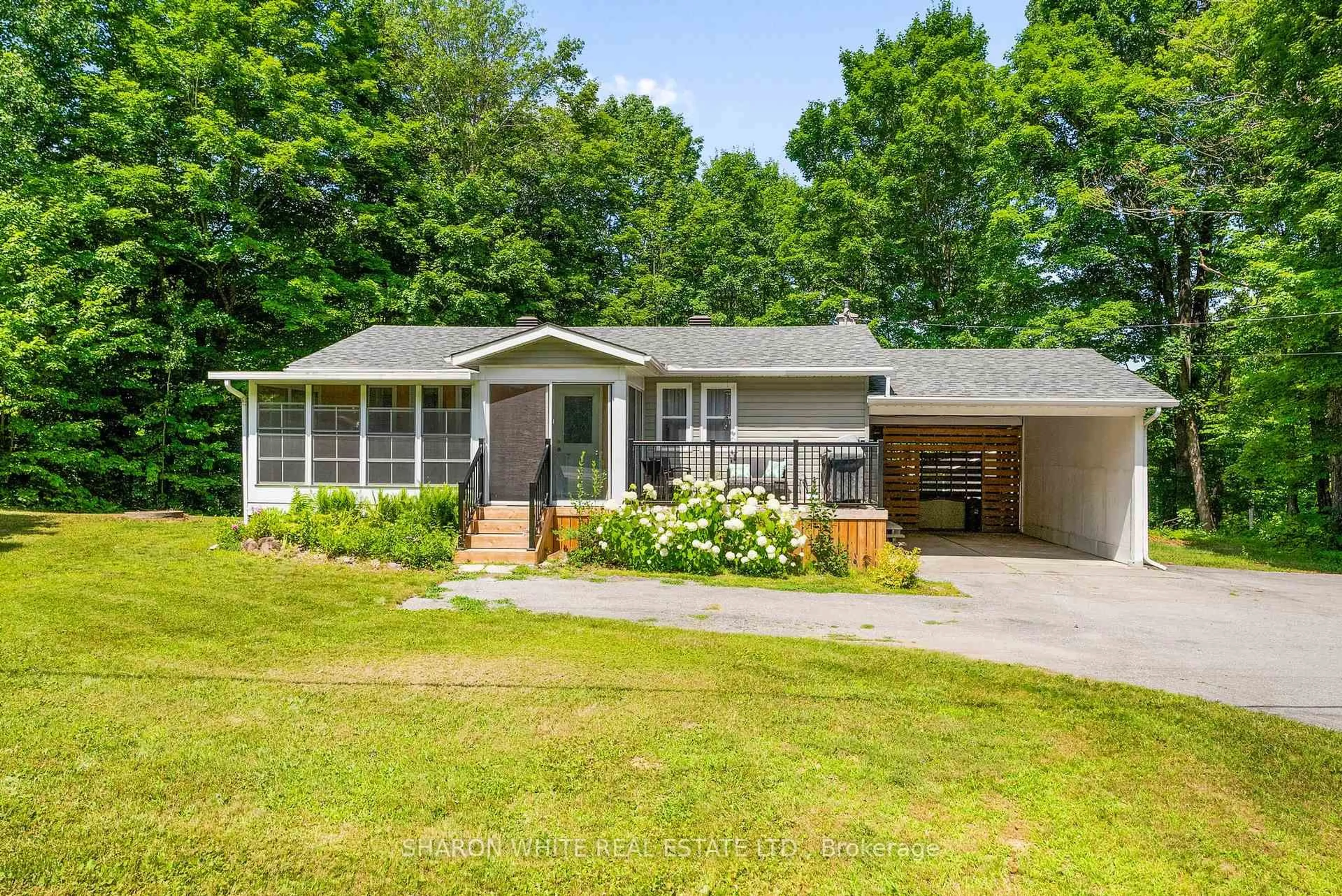 Home with vinyl exterior material, street for 1540 South Baptiste Lake Rd, Bancroft Ontario K0L 1C0