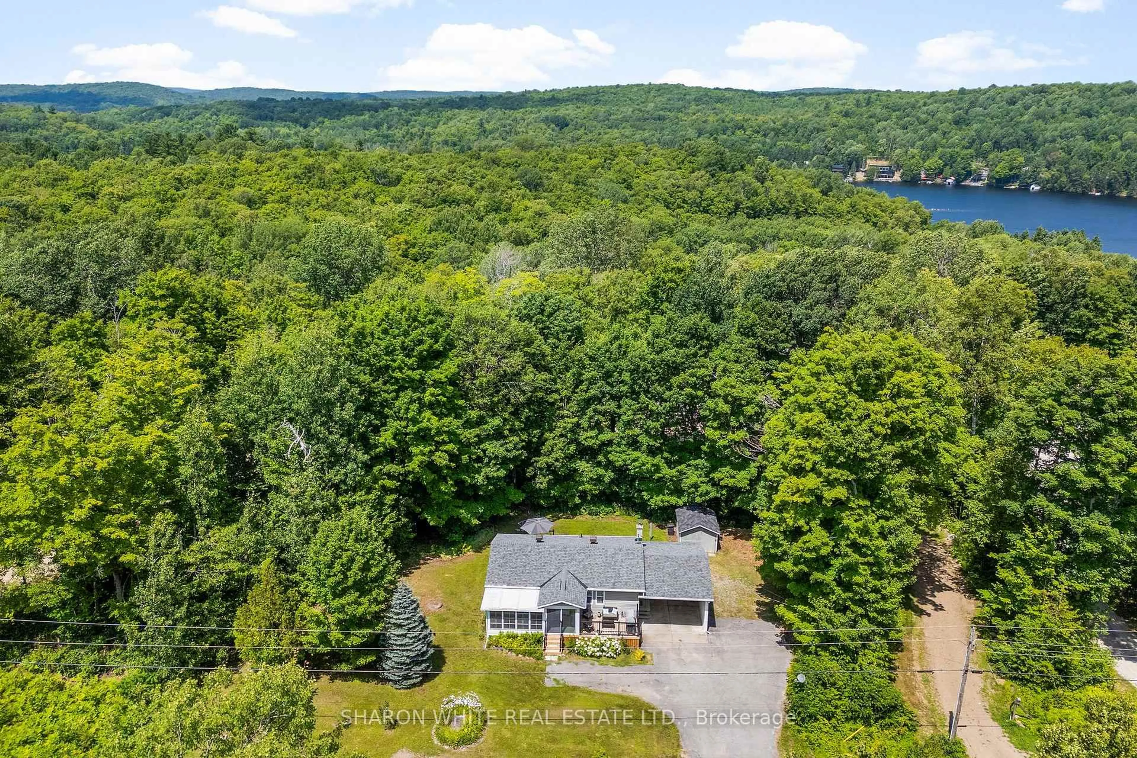 A pic from outside/outdoor area/front of a property/back of a property/a pic from drone, water/lake/river/ocean view for 1540 South Baptiste Lake Rd, Bancroft Ontario K0L 1C0