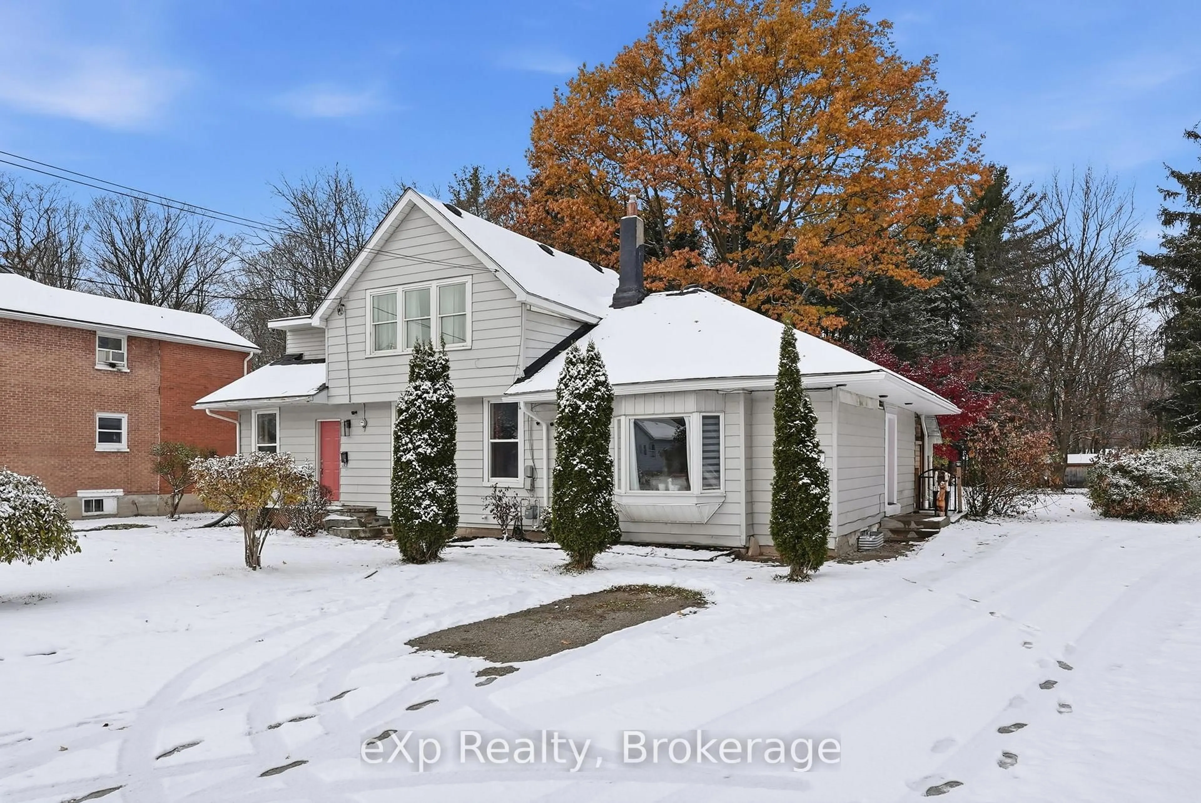 A pic from outside/outdoor area/front of a property/back of a property/a pic from drone, street for 680 11th St, Owen Sound Ontario N4K 3T3