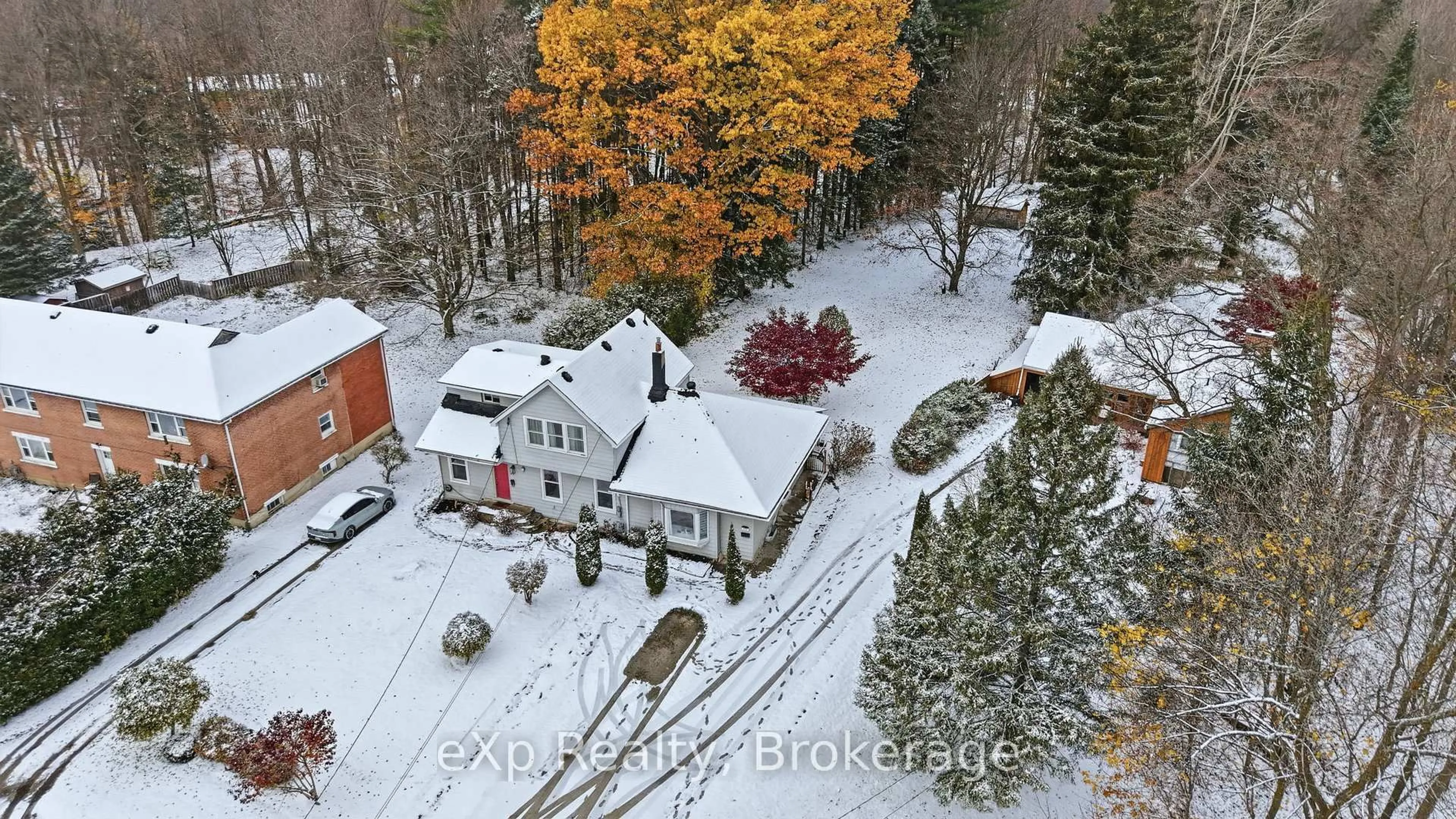 A pic from outside/outdoor area/front of a property/back of a property/a pic from drone, street for 680 11th St, Owen Sound Ontario N4K 3T3