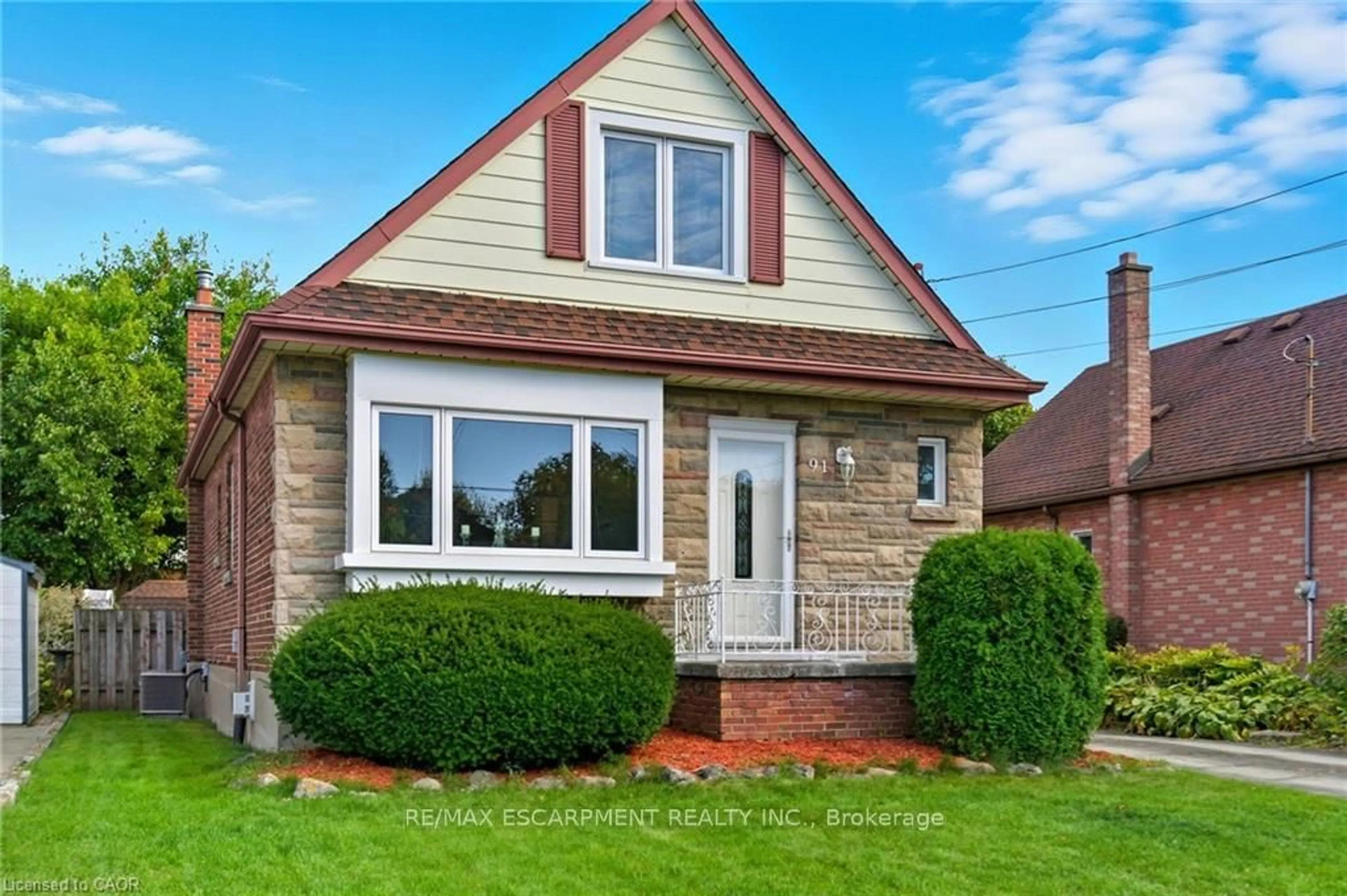 Home with brick exterior material, street for 91 East 42nd St, Hamilton Ontario L8T 3A2