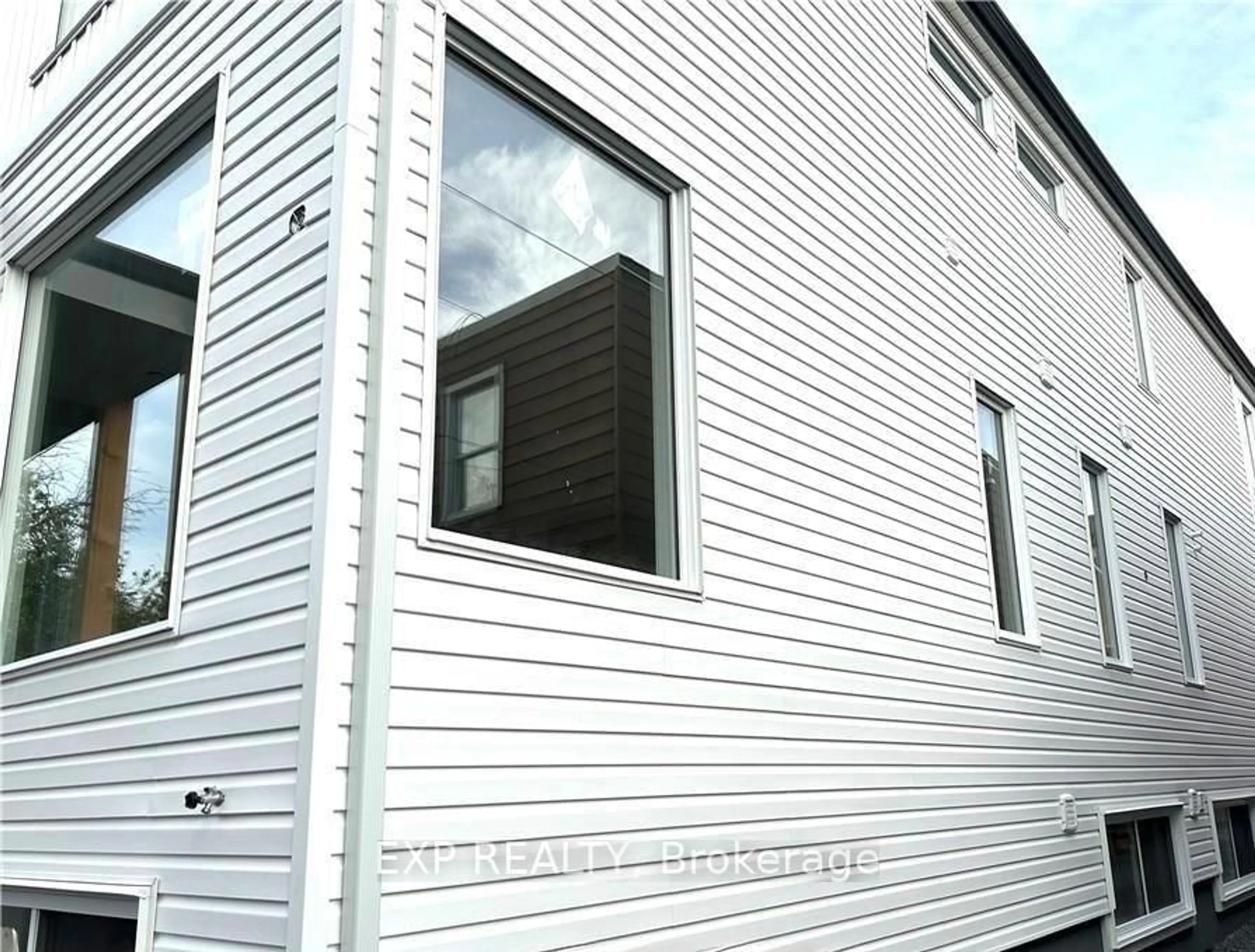 Home with vinyl exterior material, building for 25 O'meara St #A + B, Ottawa Ontario K1Y 2S8