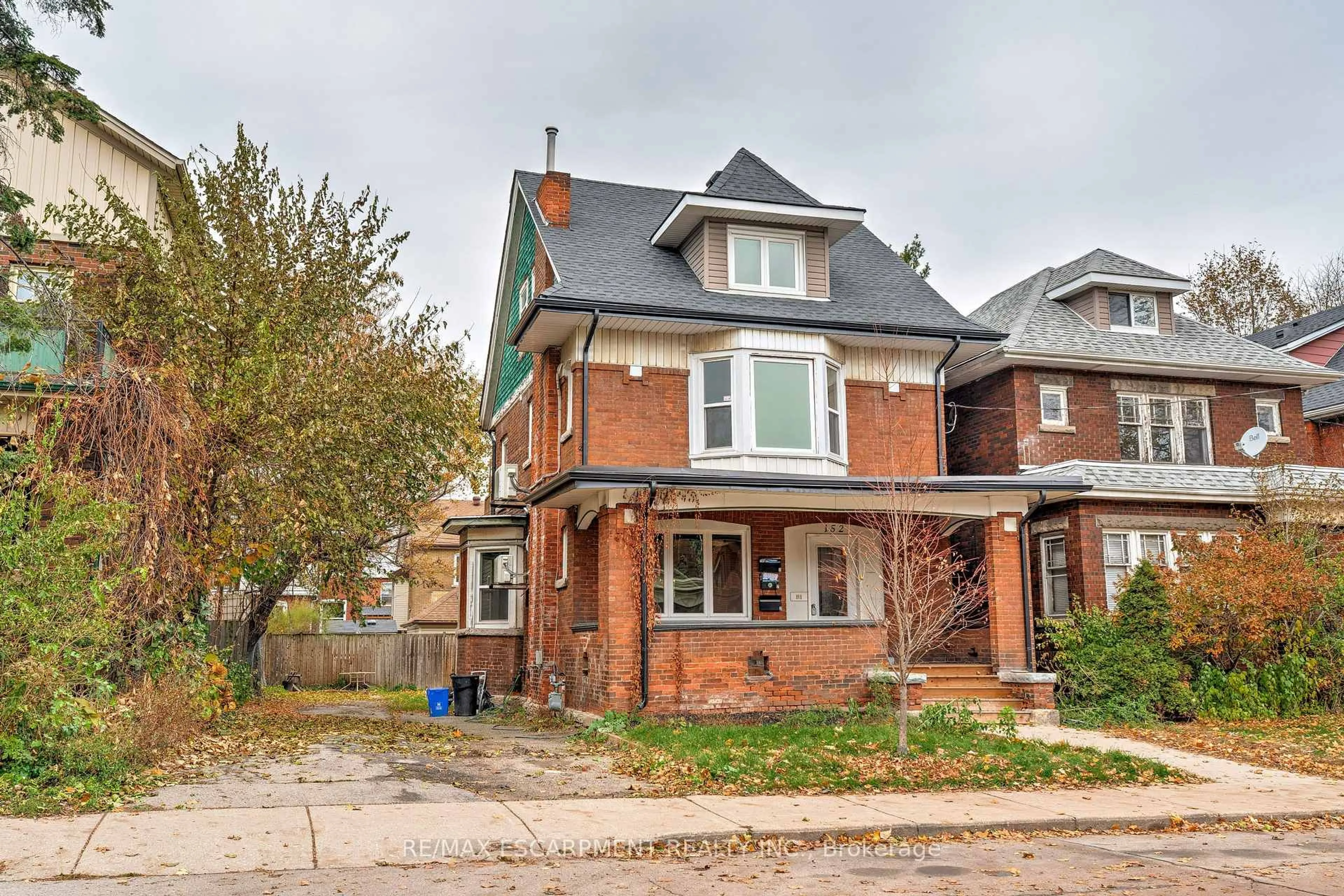 Home with brick exterior material, street for 152 Sanford Ave, Hamilton Ontario L8M 2G9