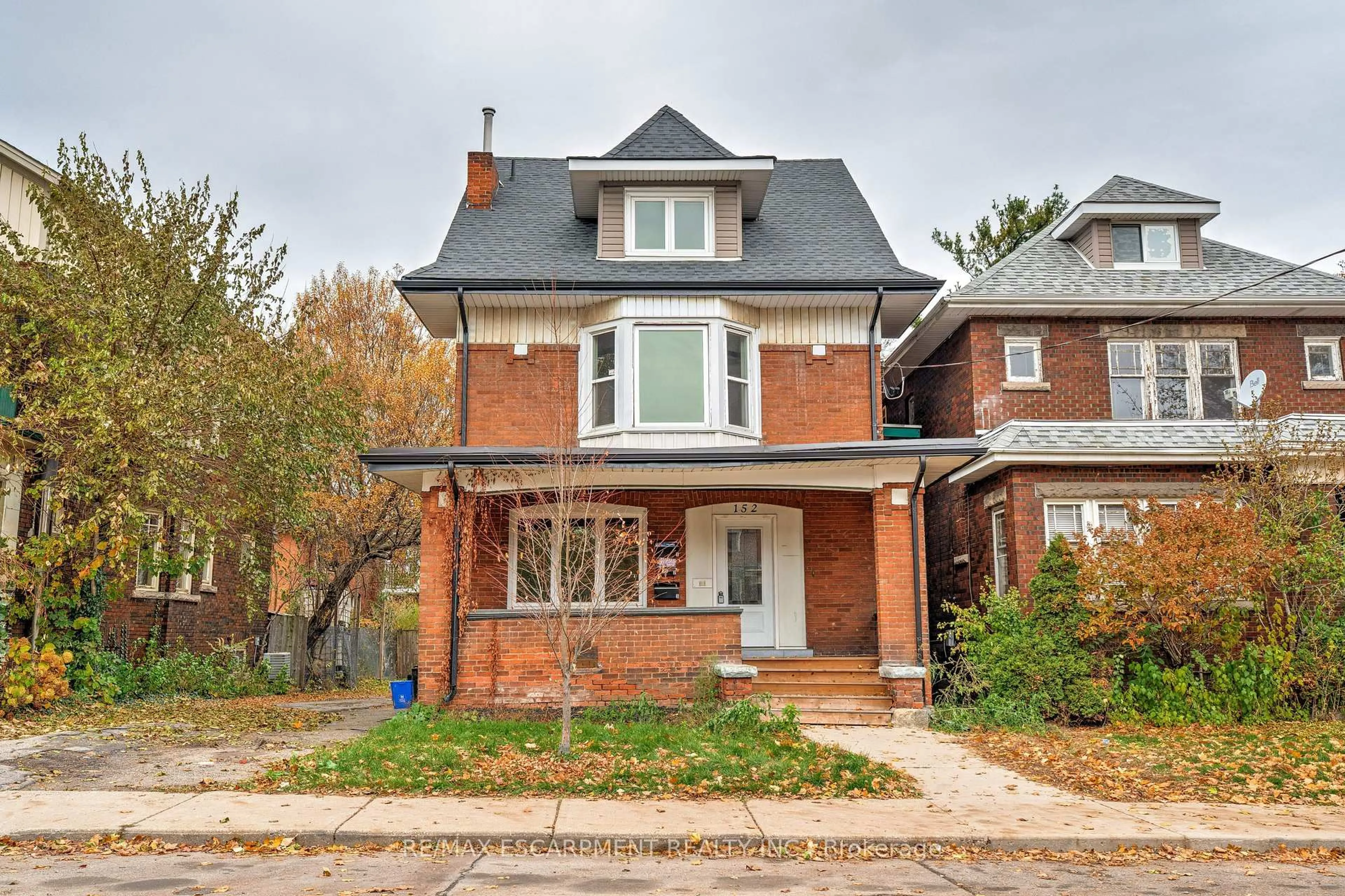 Home with brick exterior material, street for 152 Sanford Ave, Hamilton Ontario L8M 2G9