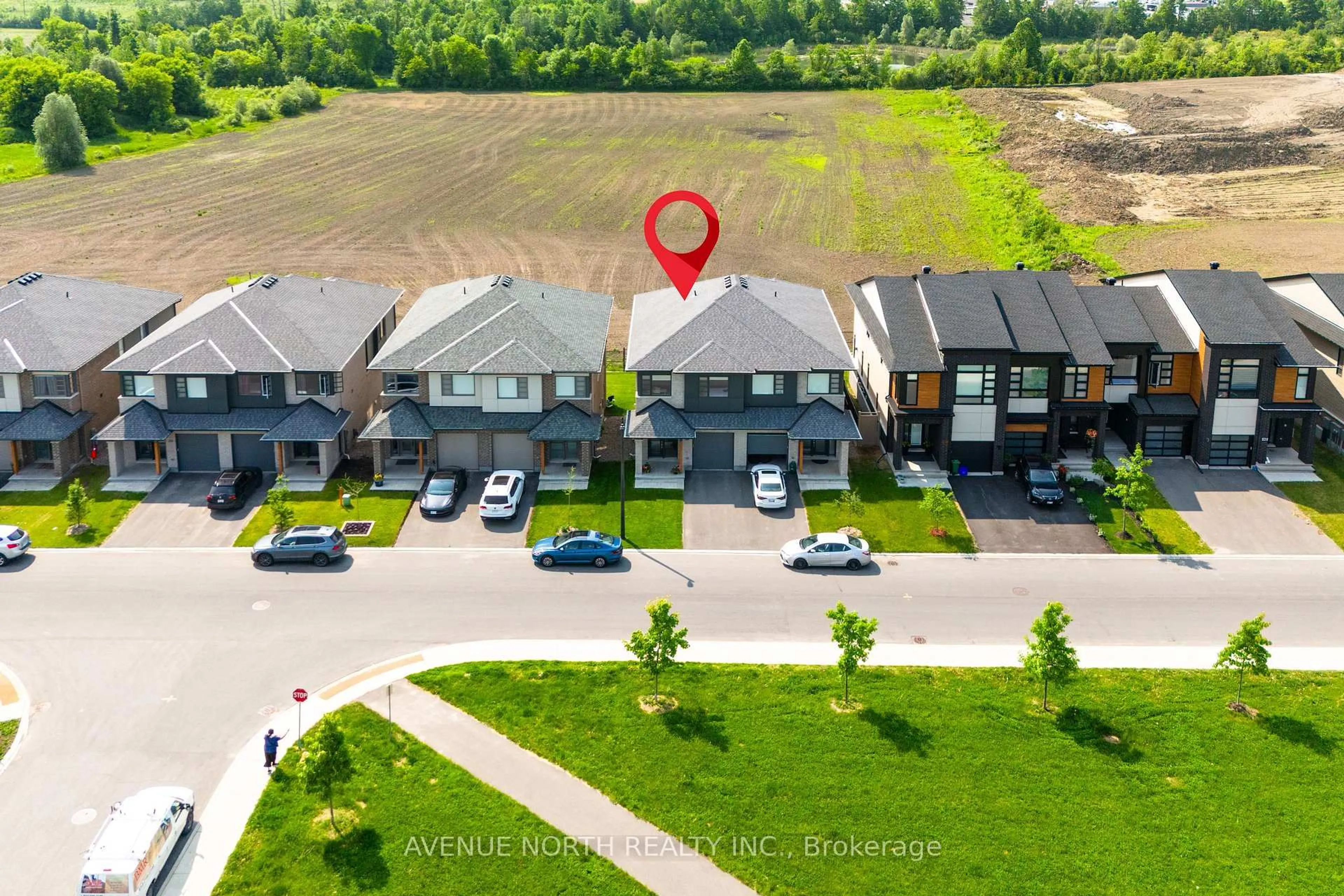 A pic from outside/outdoor area/front of a property/back of a property/a pic from drone, street for 244 Shuttleworth Dr, Ottawa Ontario K1T 0T4