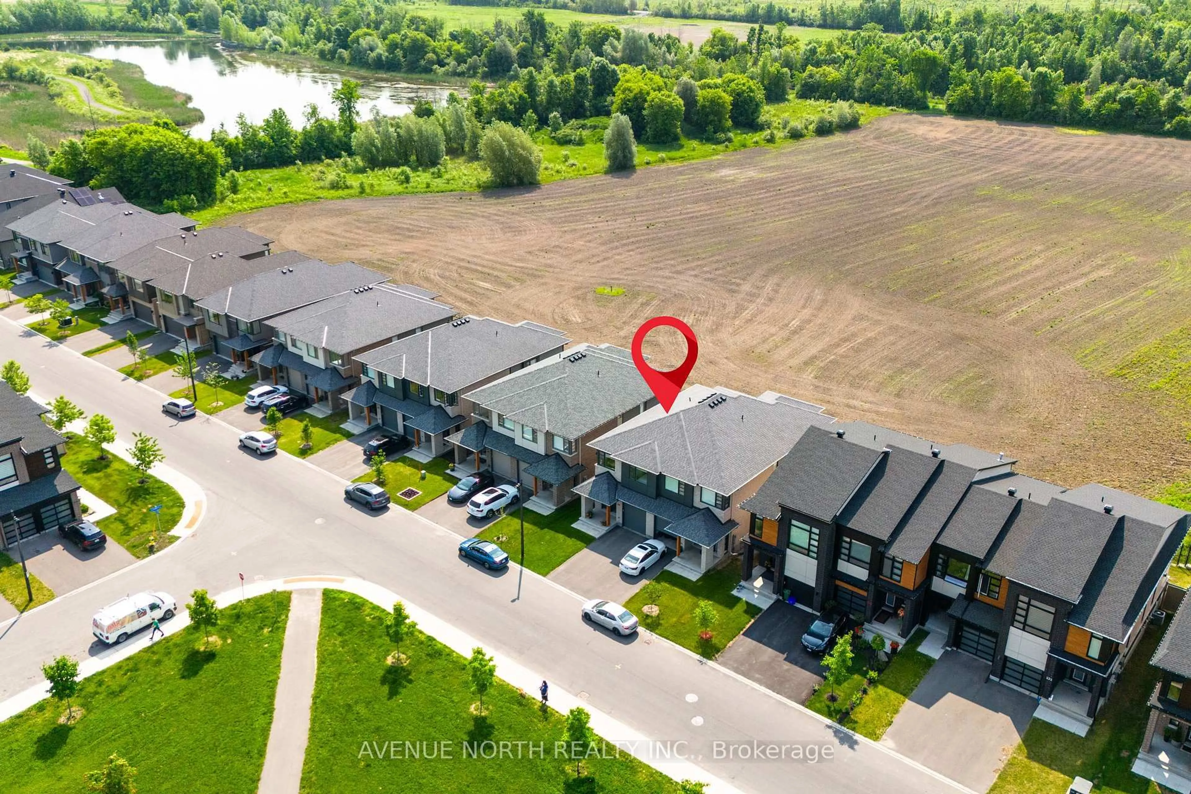 A pic from outside/outdoor area/front of a property/back of a property/a pic from drone, water/lake/river/ocean view for 244 Shuttleworth Dr, Ottawa Ontario K1T 0T4
