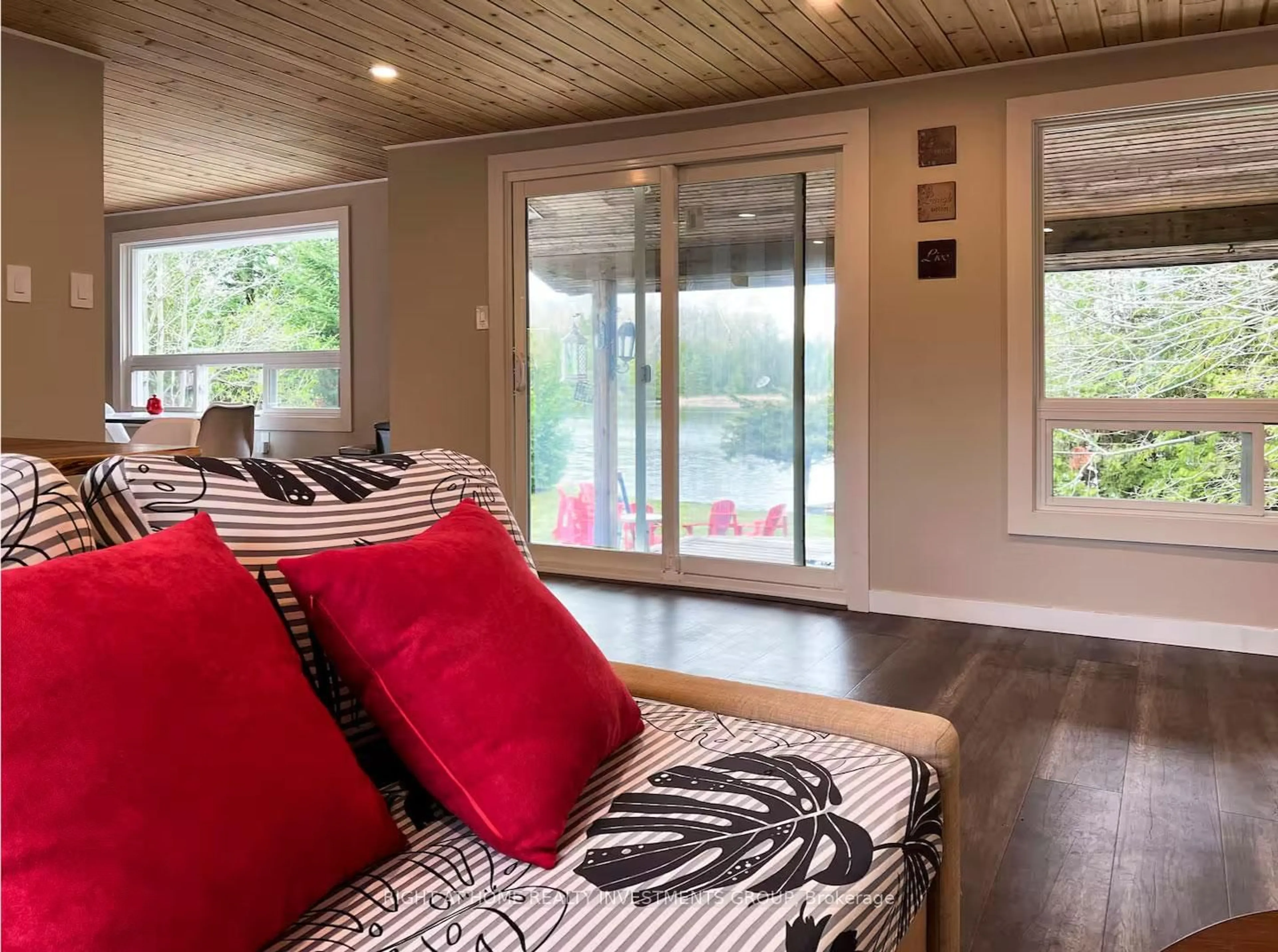 Living room with furniture, wood/laminate floor for 284 KAWARTHA HIDEAWAY Rd, Trent Lakes Ontario K0L 1J0