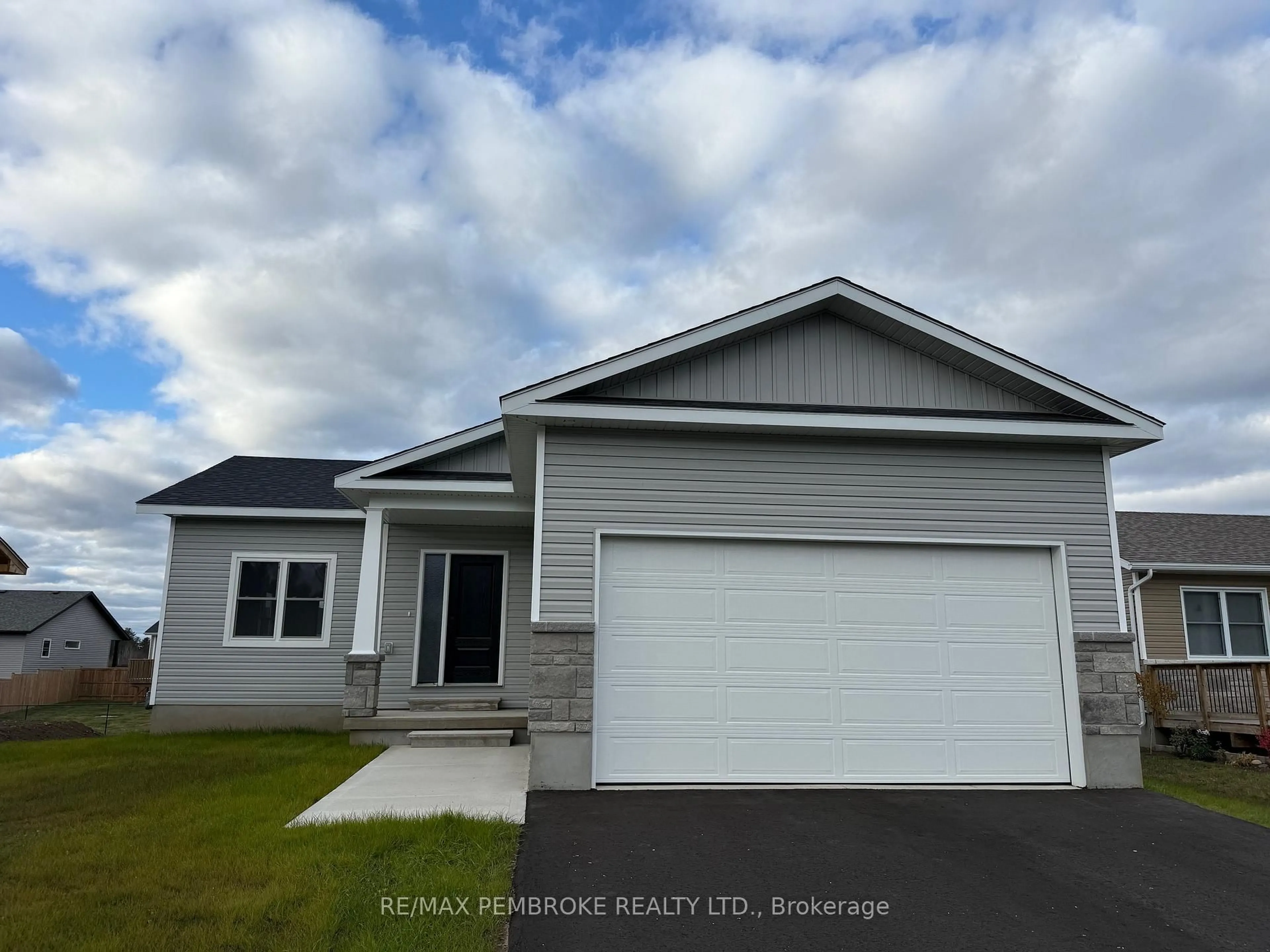 Home with vinyl exterior material, street for 14 Durant St, Petawawa Ontario K8H 0G2