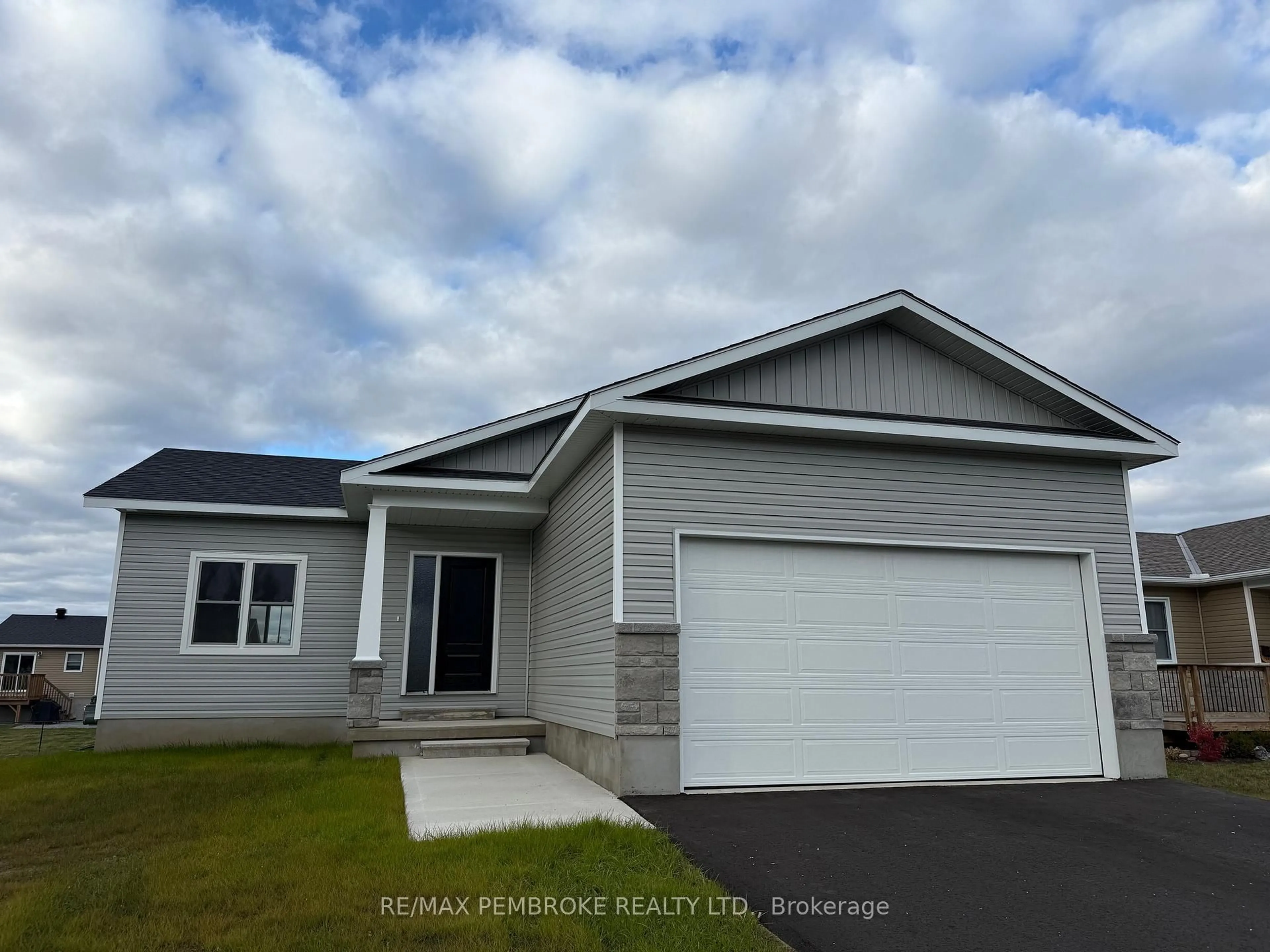 Home with vinyl exterior material, street for 14 Durant St, Petawawa Ontario K8H 0G2