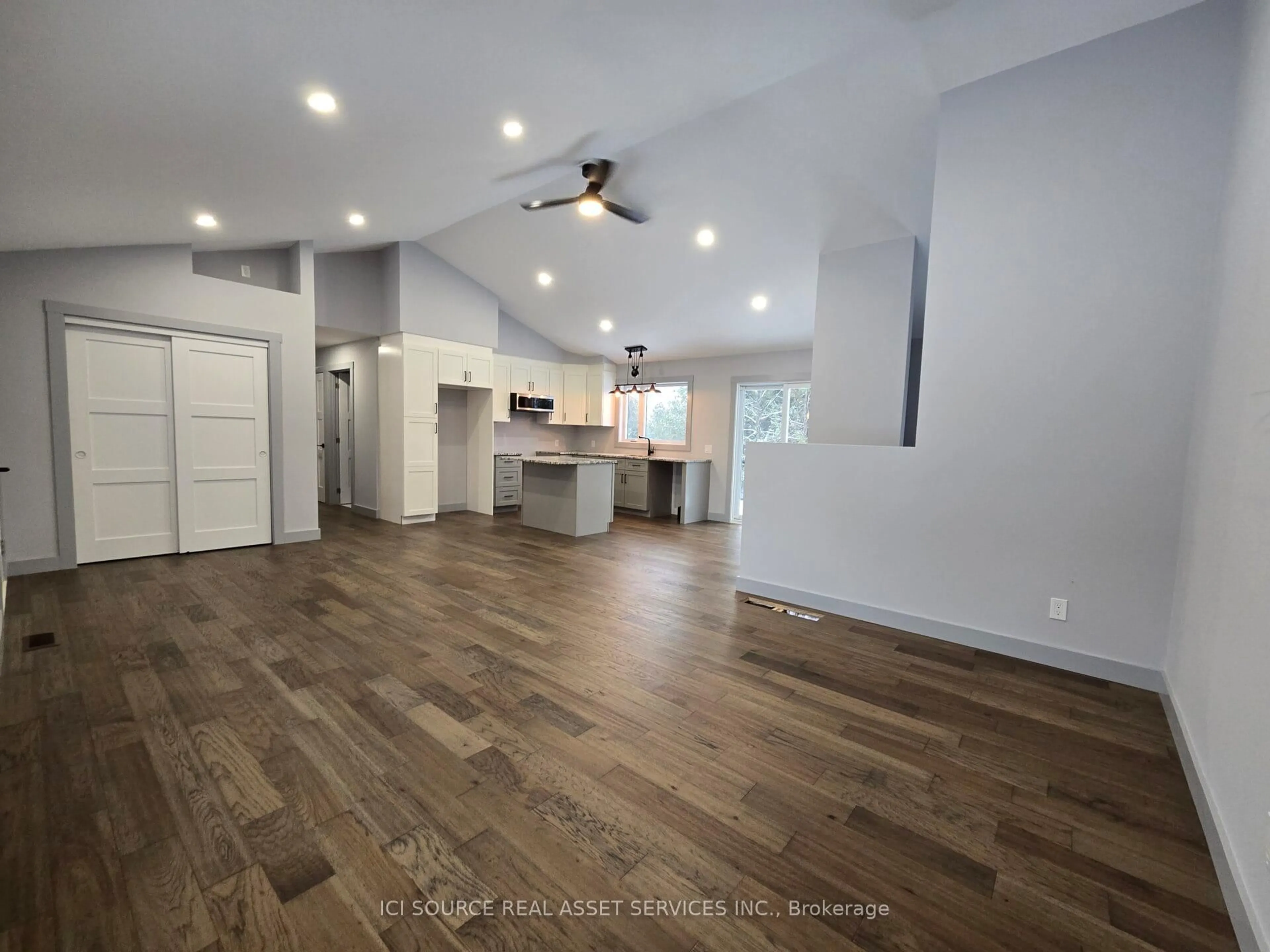 Open concept kitchen, wood/laminate floor for 7367 Roger Stevens Dr, Smiths Falls Ontario K7A 4S6