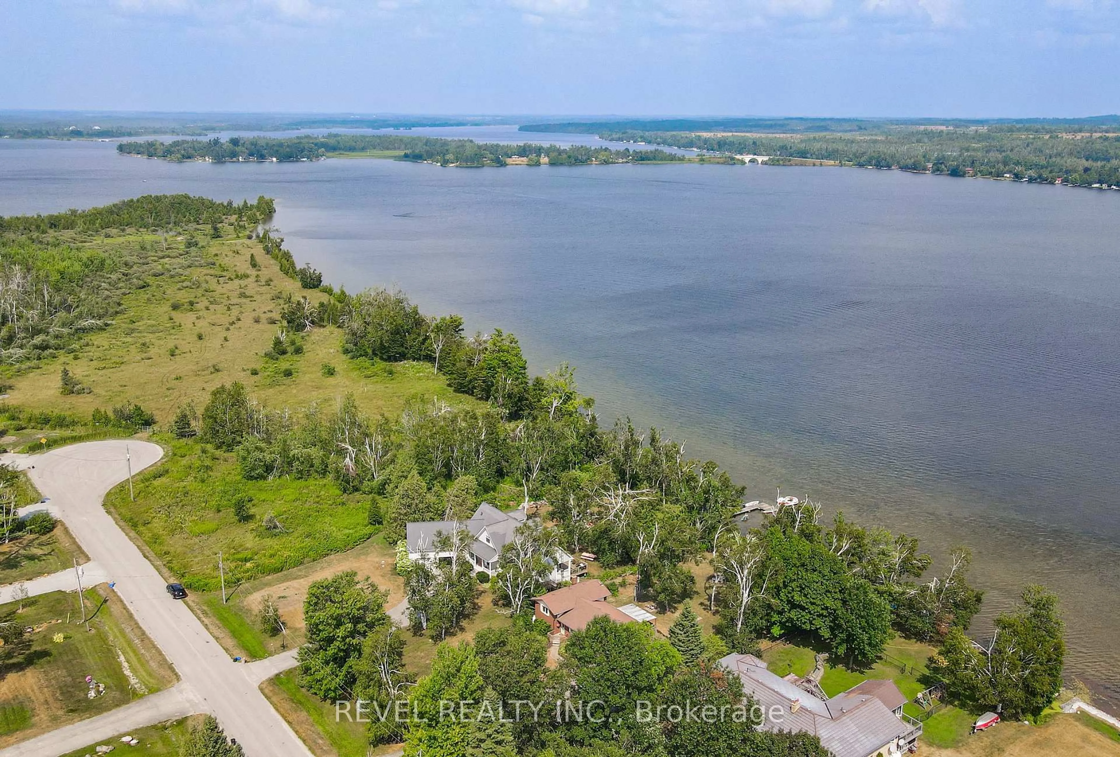 A pic from outside/outdoor area/front of a property/back of a property/a pic from drone, water/lake/river/ocean view for 126 Pinewood Blvd, Kawartha Lakes Ontario K0M 2T0