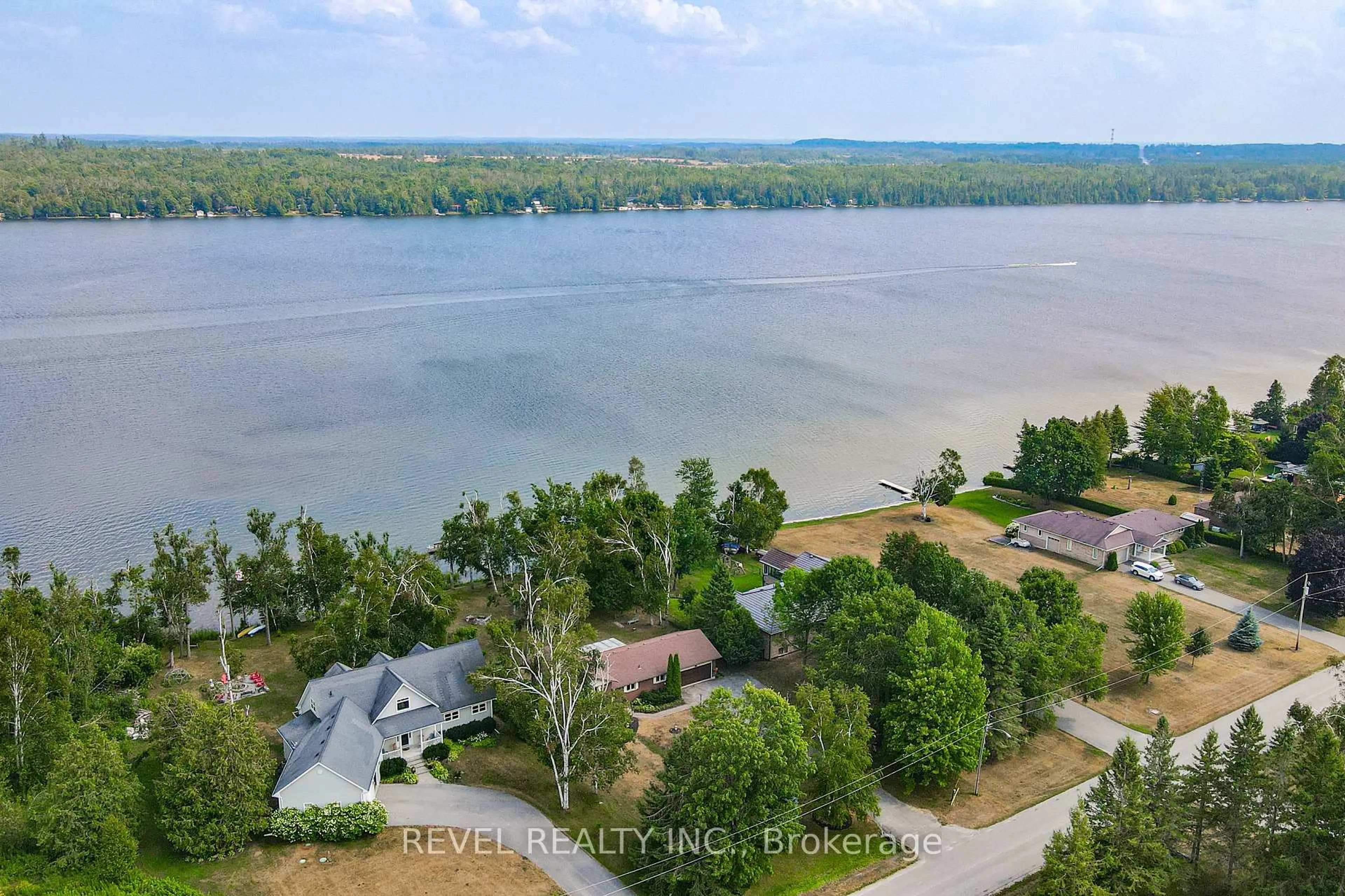 A pic from outside/outdoor area/front of a property/back of a property/a pic from drone, water/lake/river/ocean view for 126 Pinewood Blvd, Kawartha Lakes Ontario K0M 2T0