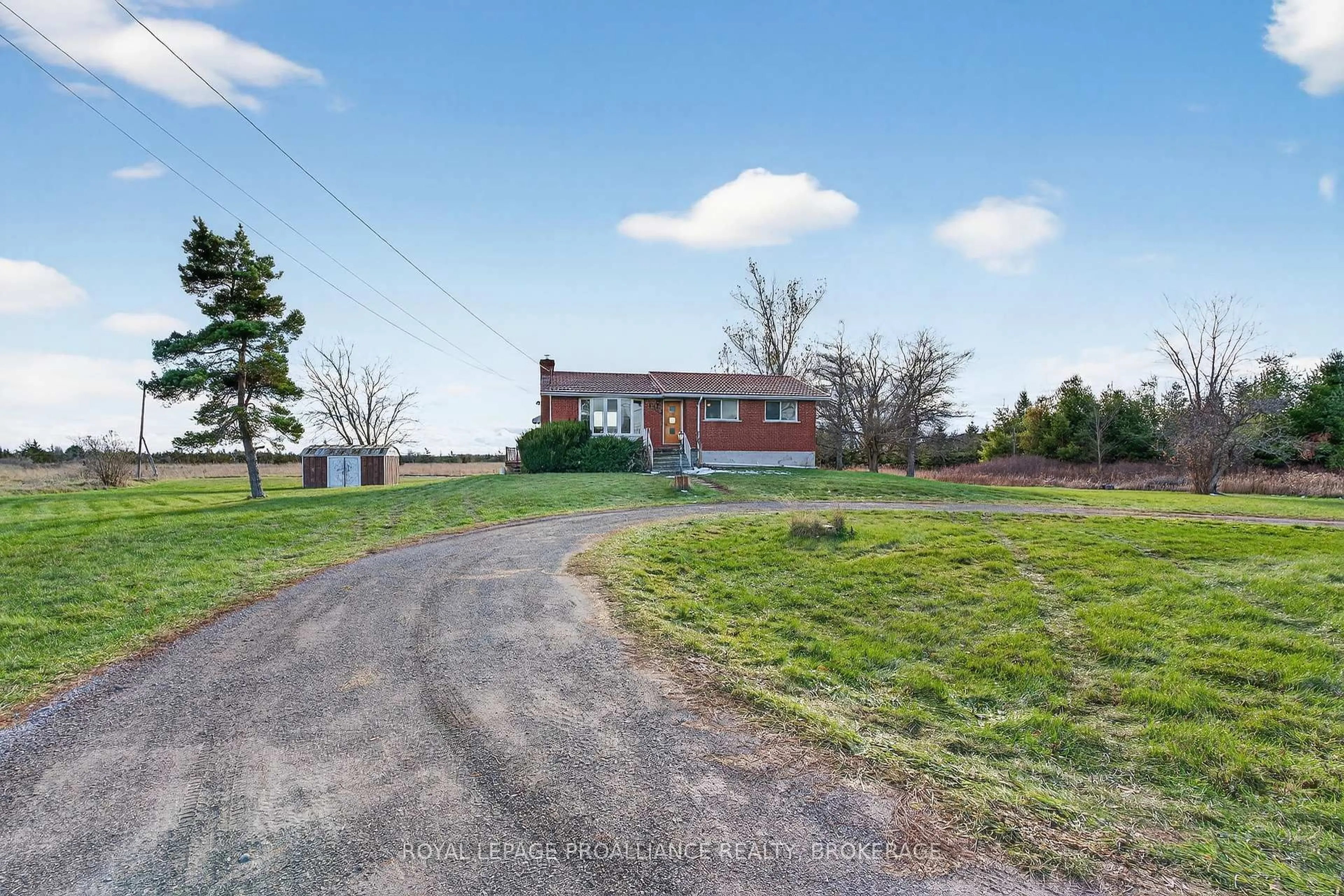 A pic from outside/outdoor area/front of a property/back of a property/a pic from drone, unknown for 5000 County Road 2, Bissett Creek Ontario K0H 2H0