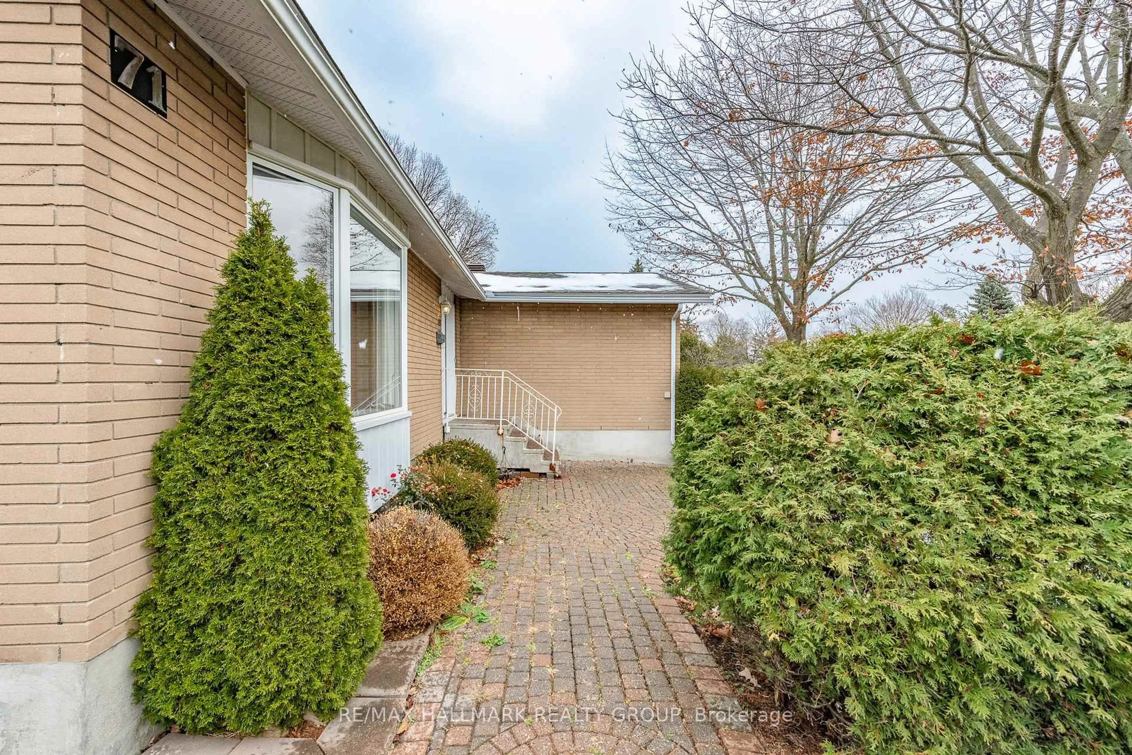 Home with brick exterior material, street for 71 Viewmount Dr, Ottawa Ontario K2G 3B9