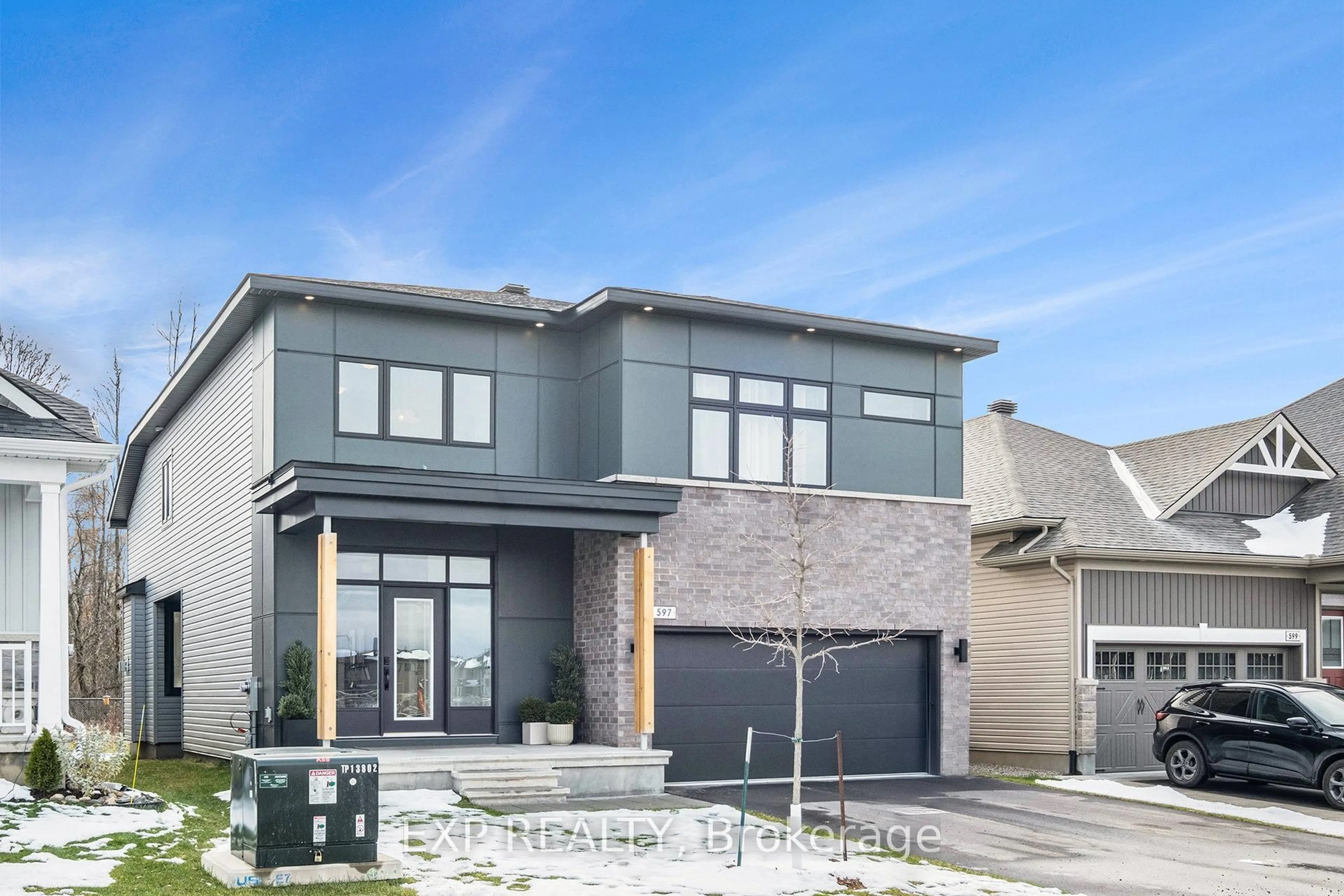 Home with brick exterior material, street for 597 Paakanaak Ave, Ottawa Ontario K1X 0H4