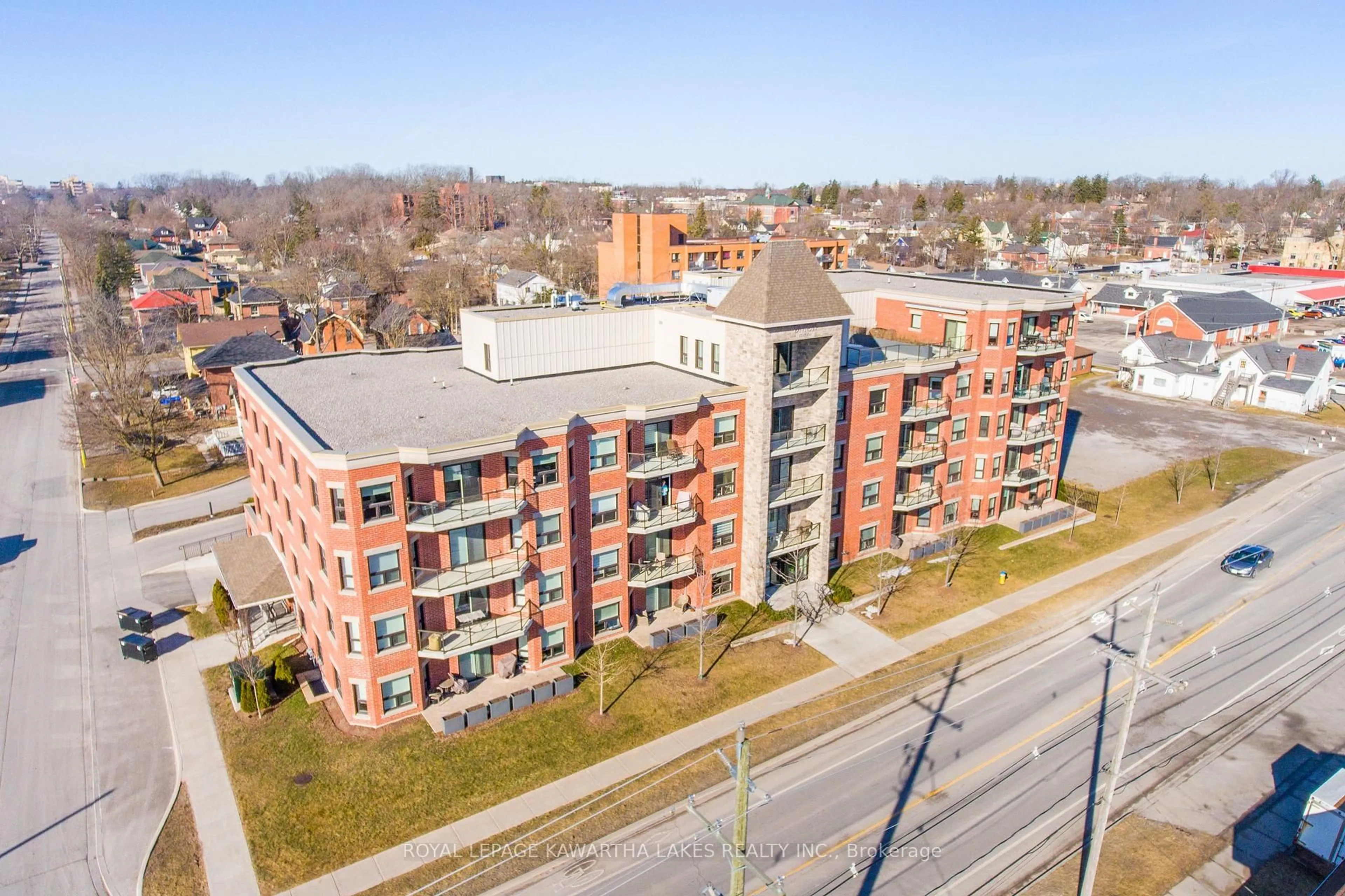 A pic from outside/outdoor area/front of a property/back of a property/a pic from drone, building for 58 Glenelg St #105, Kawartha Lakes Ontario K9V 0M9