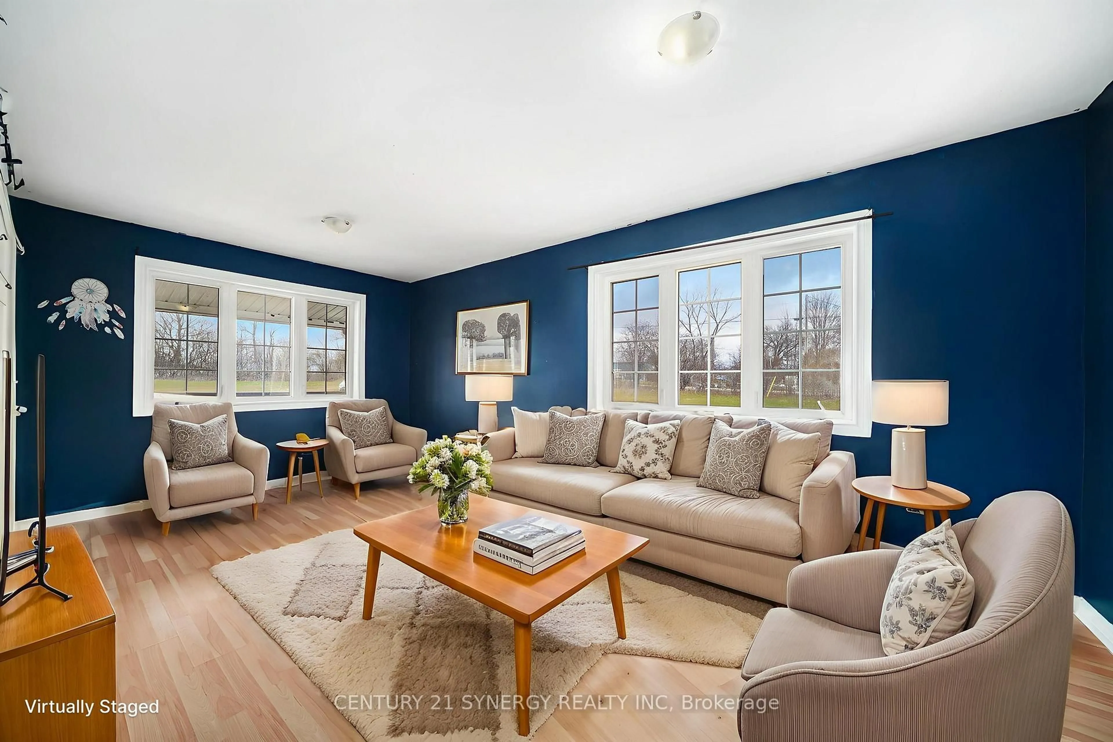 Living room with furniture, wood/laminate floor for 385 Wood Rd, Smiths Falls Ontario K7A 5B8