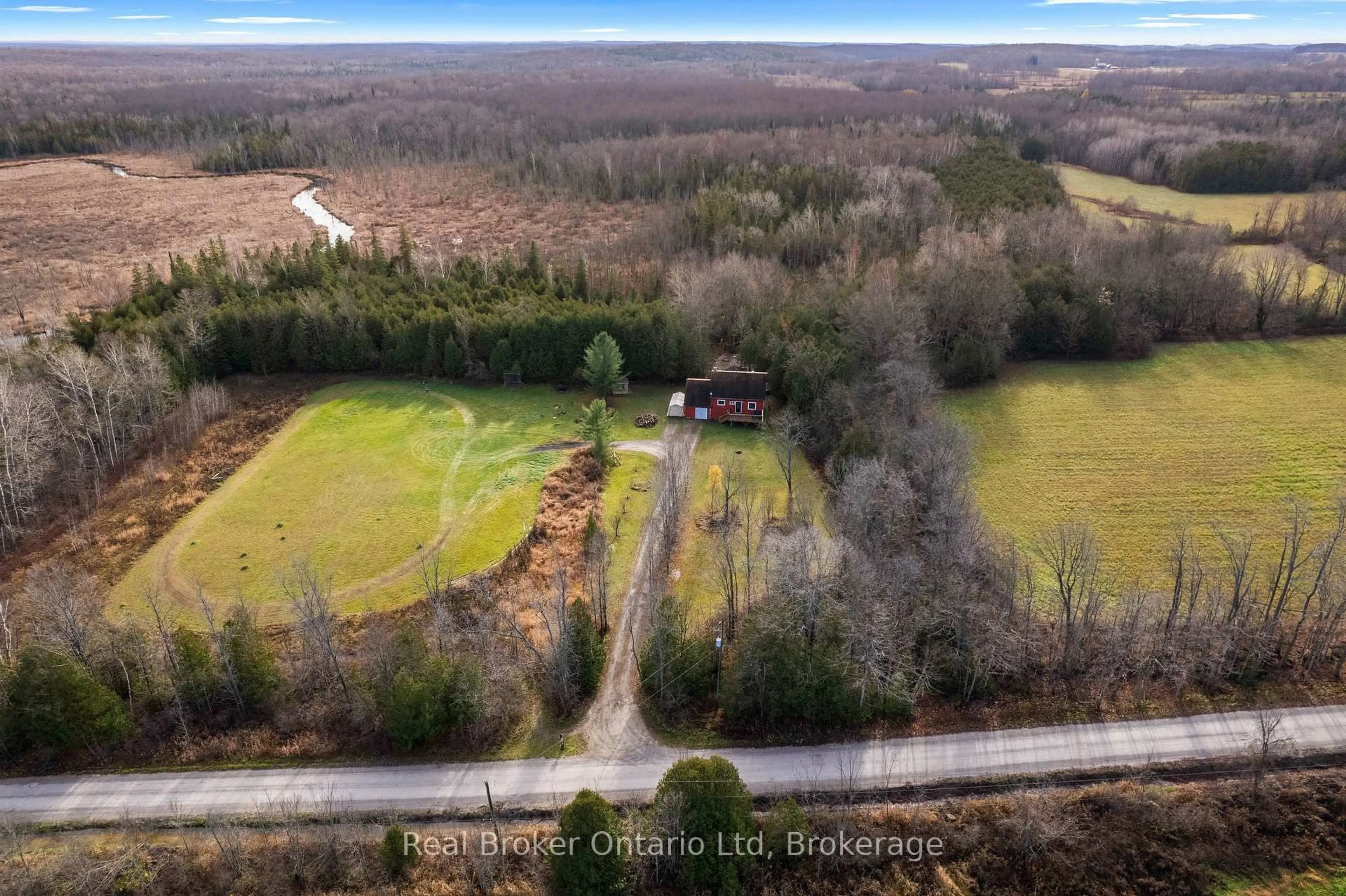 A pic from outside/outdoor area/front of a property/back of a property/a pic from drone, forest/trees view for 362120 Concession 16, Georgian Bluffs Ontario N0H 1P0