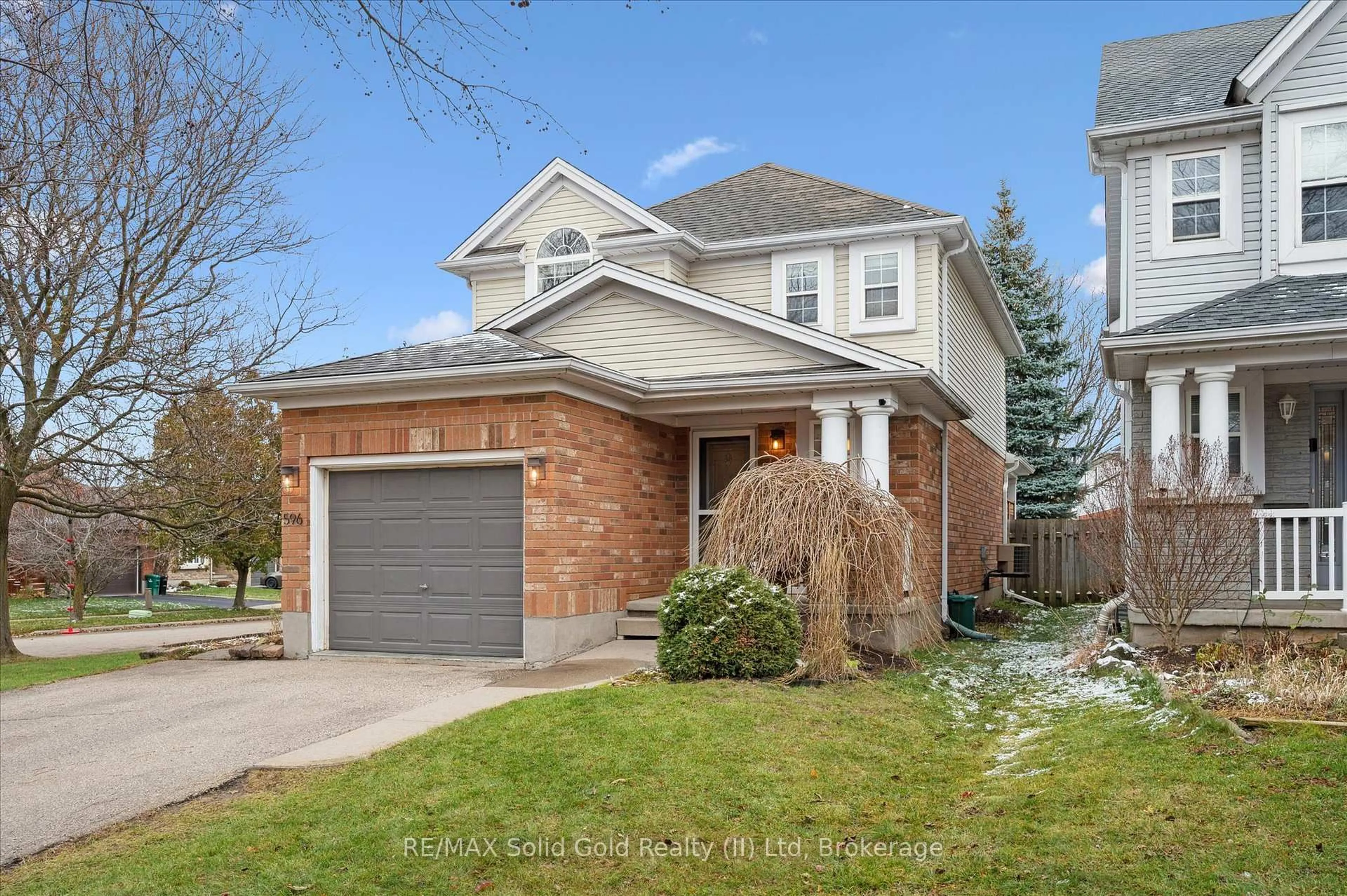 Home with brick exterior material, street for 596 Canso Pl, Waterloo Ontario N2K 3Z6