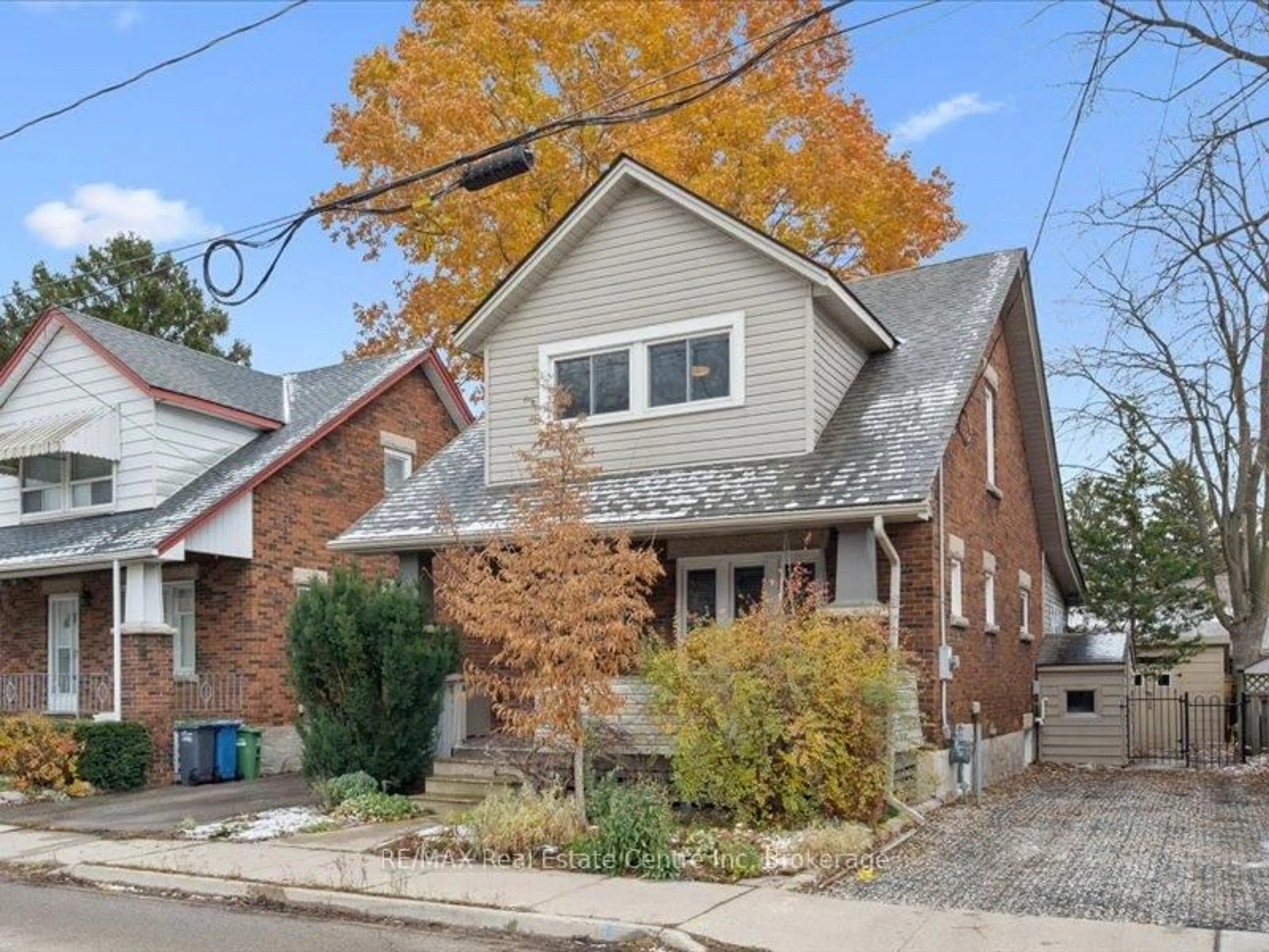 Home with brick exterior material, street for 62 Division St, Guelph Ontario N1H 1R2