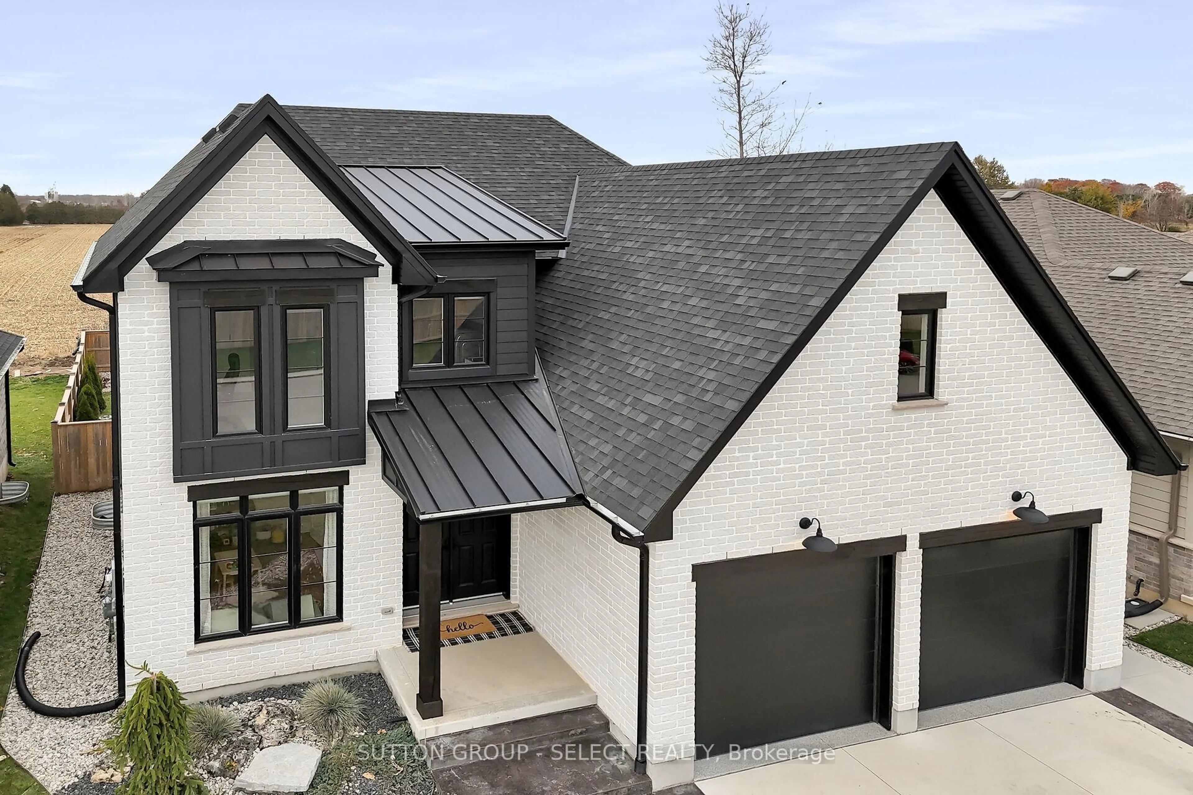 Home with brick exterior material, street for 173 Collins Way, Strathroy-Caradoc Ontario N7G 0G2