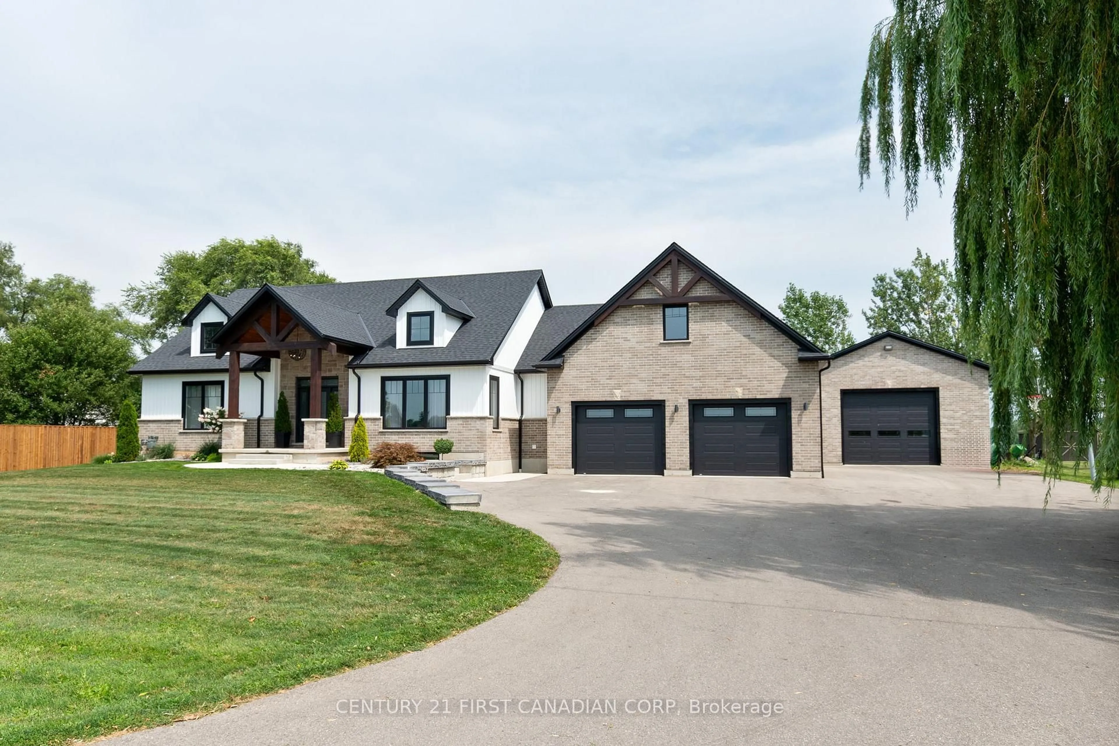 Home with brick exterior material, street for 8848 Walker Rd, Malahide Ontario N5H 2R1