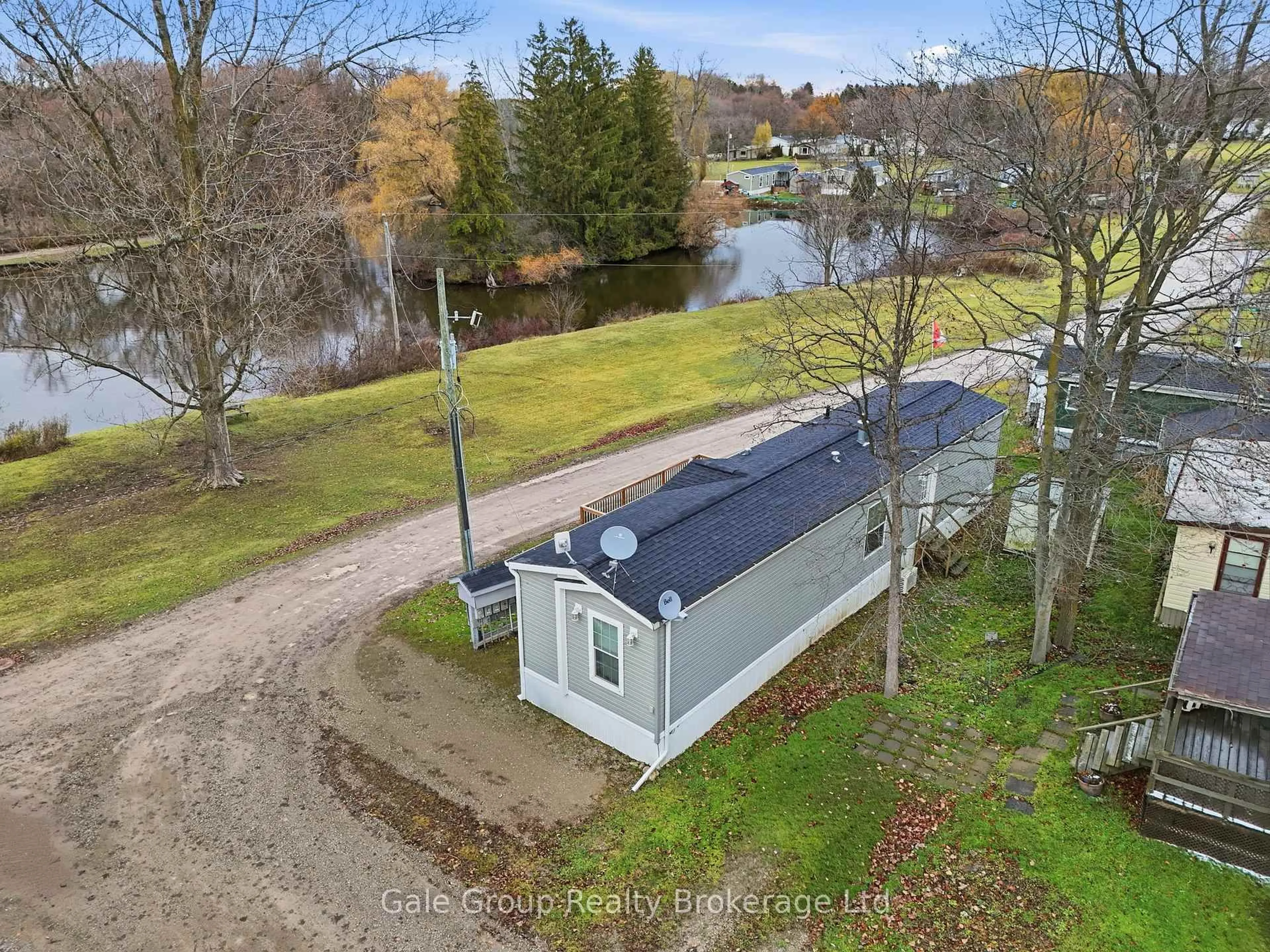 A pic from outside/outdoor area/front of a property/back of a property/a pic from drone, water/lake/river/ocean view for 596101 Oxford 59 Highway ##1 Whylie, East Zorra-Tavistock Ontario N4S 7W1