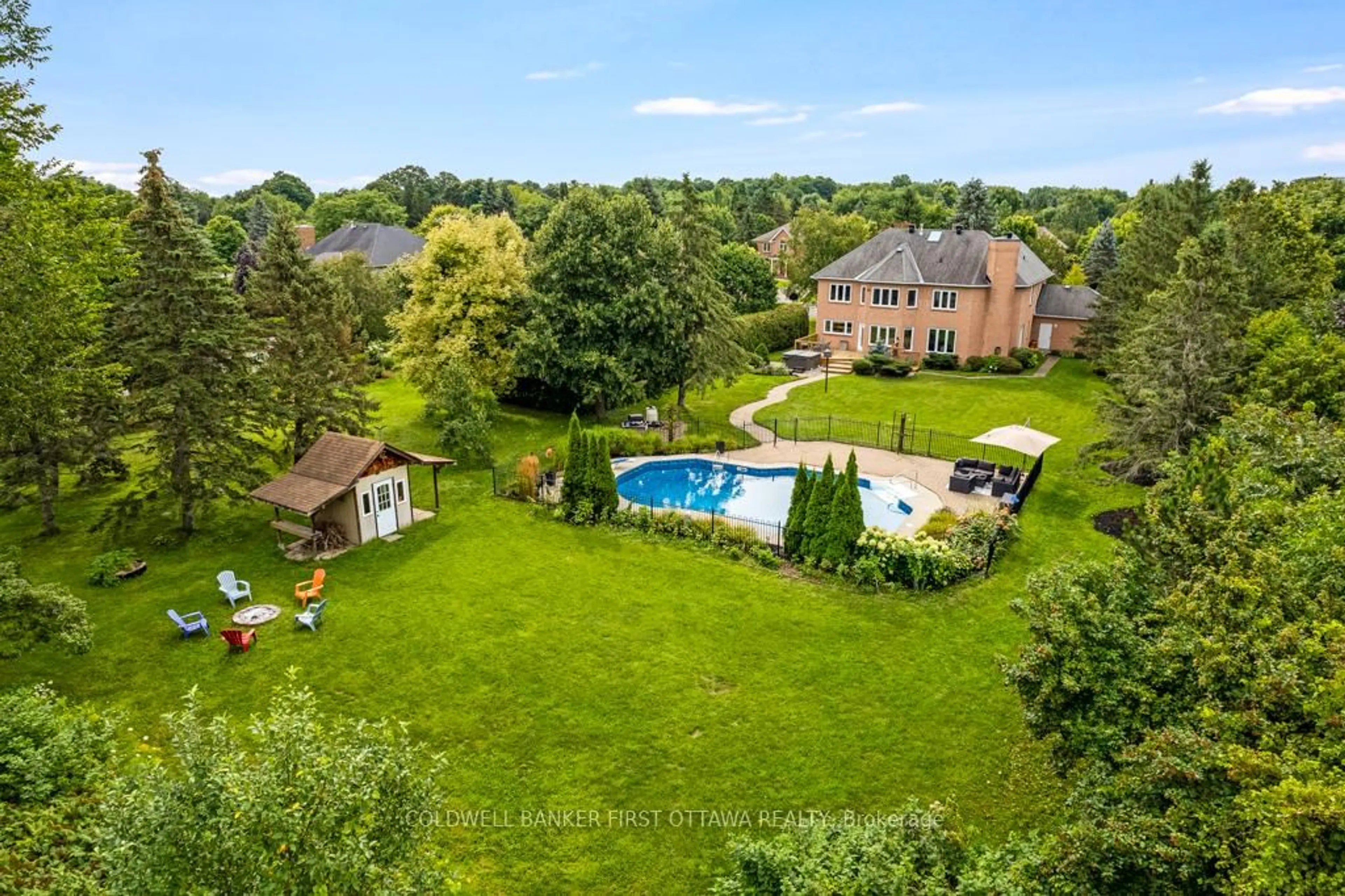 A pic from outside/outdoor area/front of a property/back of a property/a pic from drone, water/lake/river/ocean view for 5525 PETTAPIECE Cres, Manotick Ontario K4M 1C6