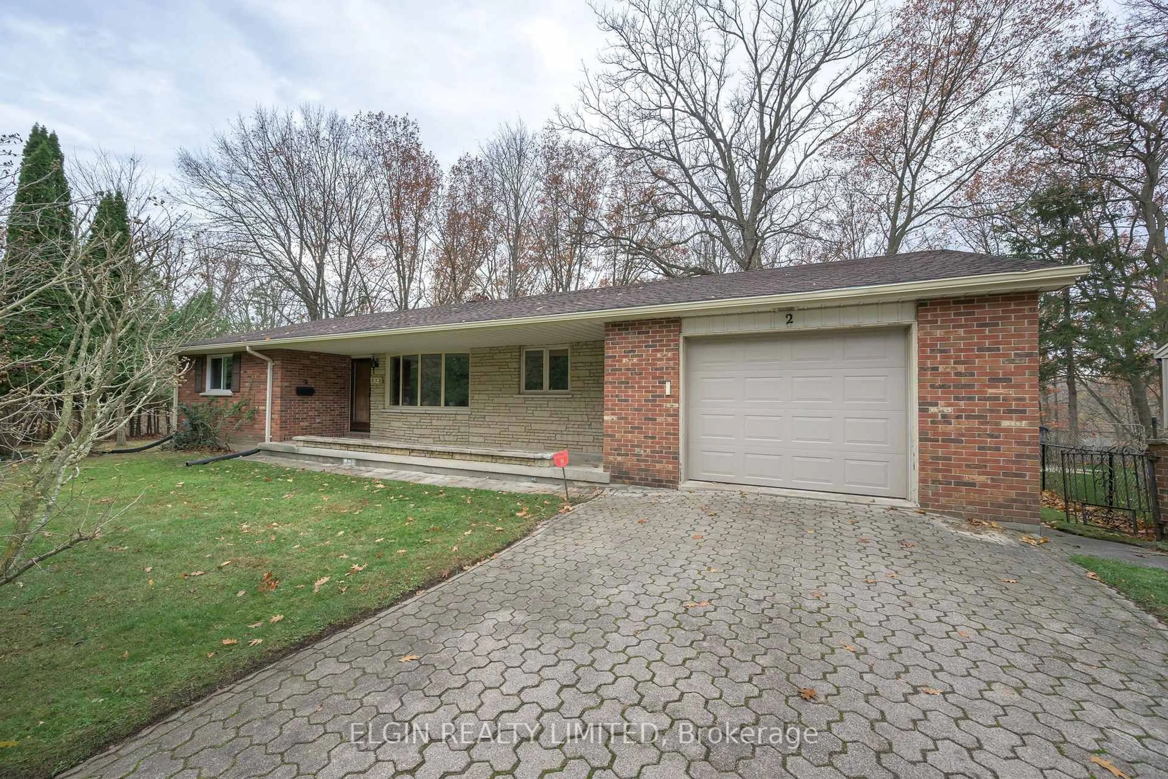 Home with brick exterior material, street for 2 Oak St, St. Thomas Ontario N5R 1R4