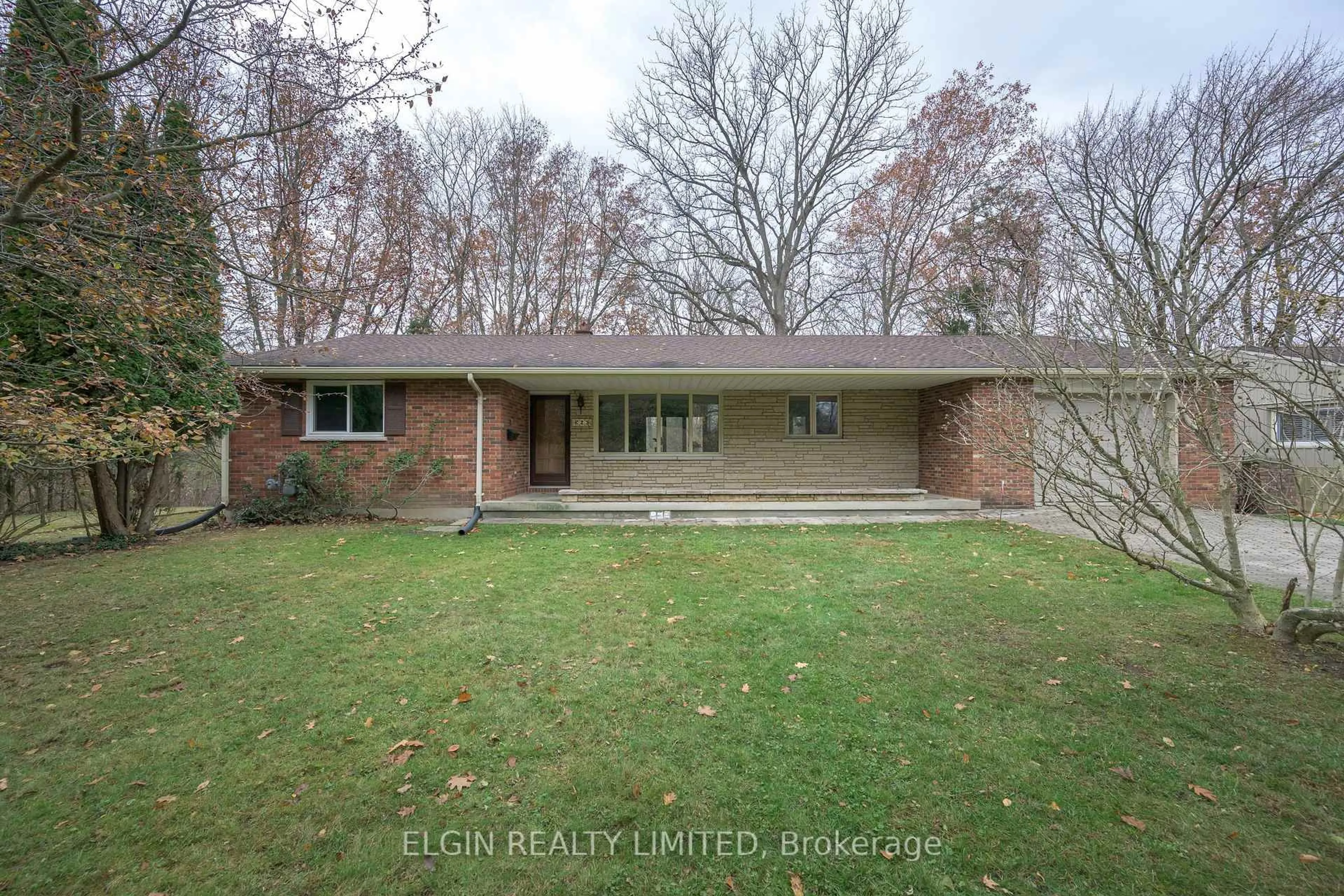 Home with brick exterior material, street for 2 Oak St, St. Thomas Ontario N5R 1R4