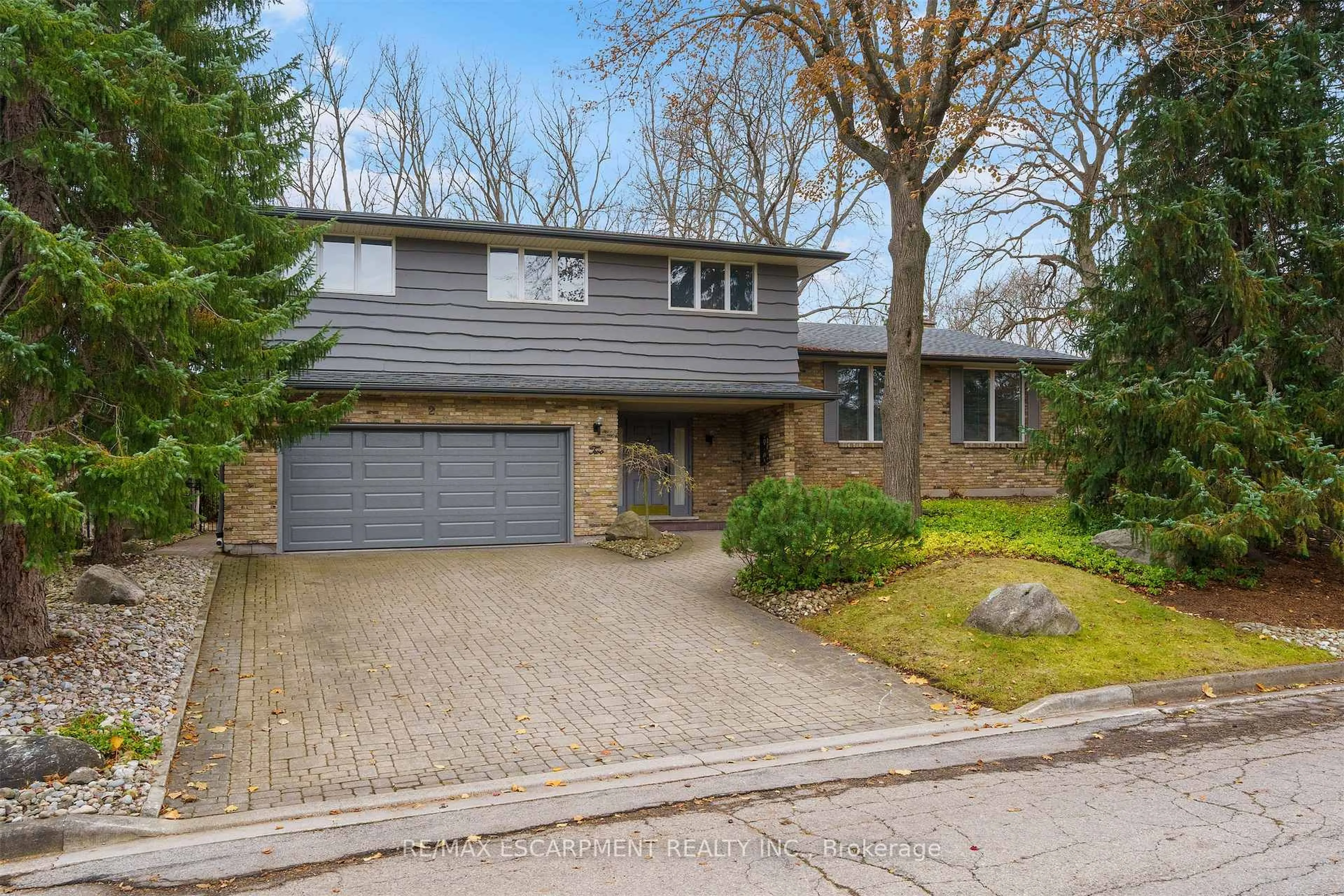 Home with brick exterior material, street for 2 Walnut Grve, Hamilton Ontario L9H 3M4