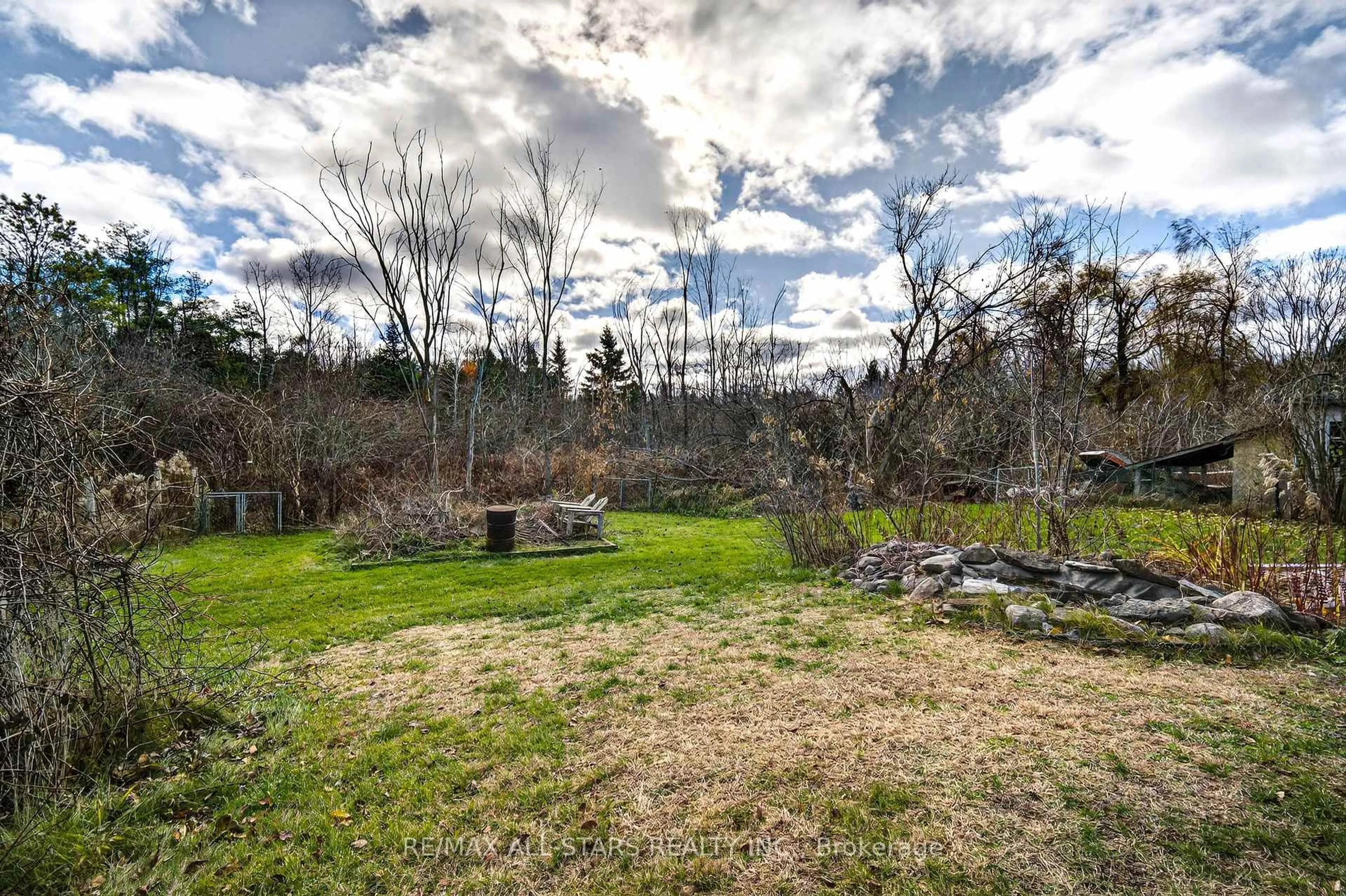 A pic from outside/outdoor area/front of a property/back of a property/a pic from drone, forest/trees view for 150 King St, Kawartha Lakes Ontario K0L 2W0