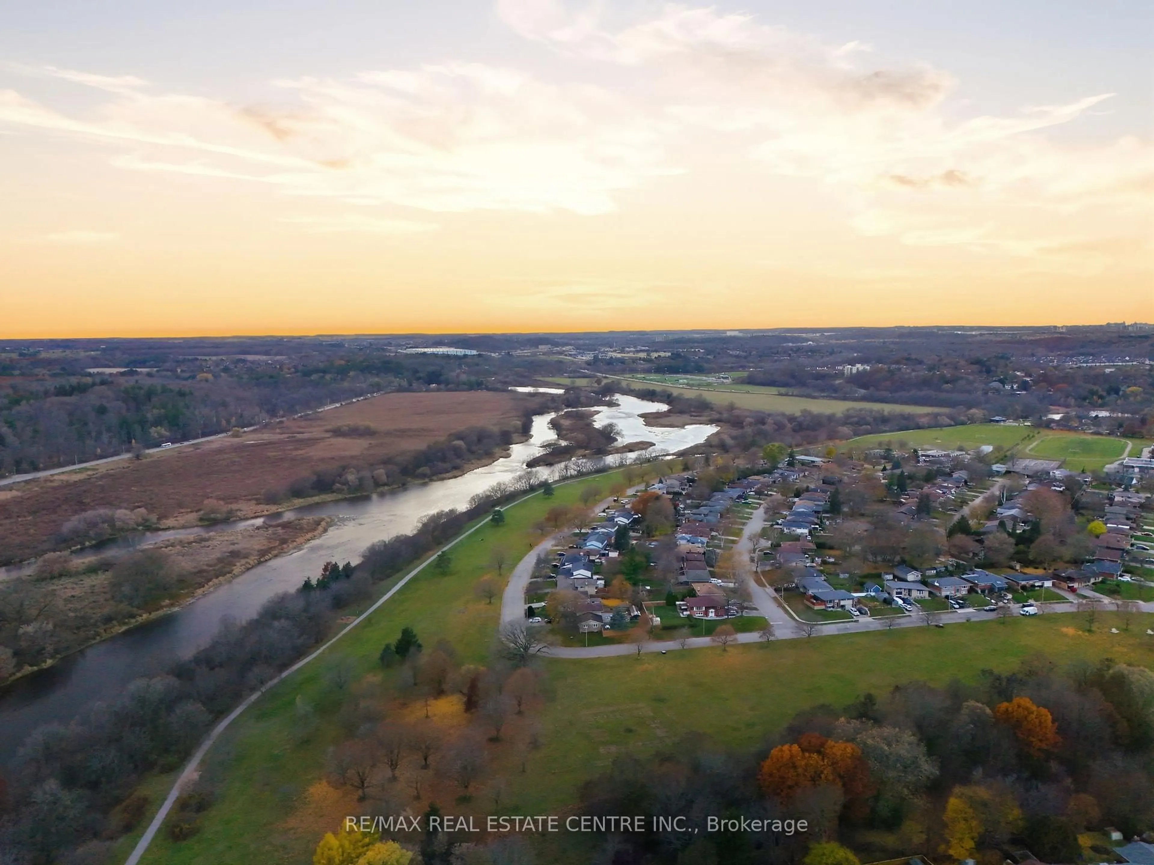 A pic from outside/outdoor area/front of a property/back of a property/a pic from drone, water/lake/river/ocean view for 1057 Clare Ave, Cambridge Ontario N3H 2E2