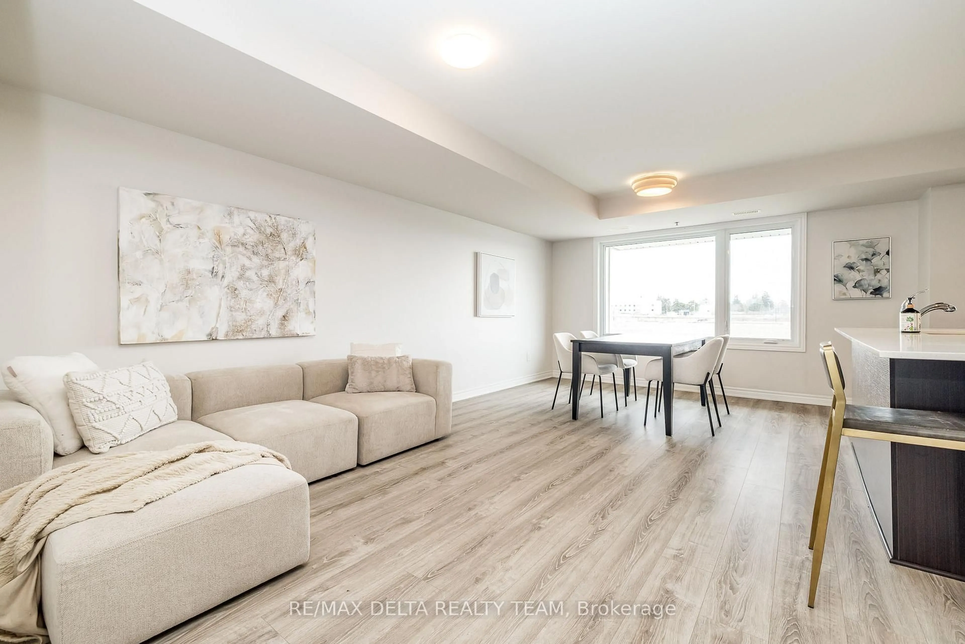 Living room with furniture, wood/laminate floor for 509 Ozawa Private #37, Ottawa Ontario K1K 4Z8