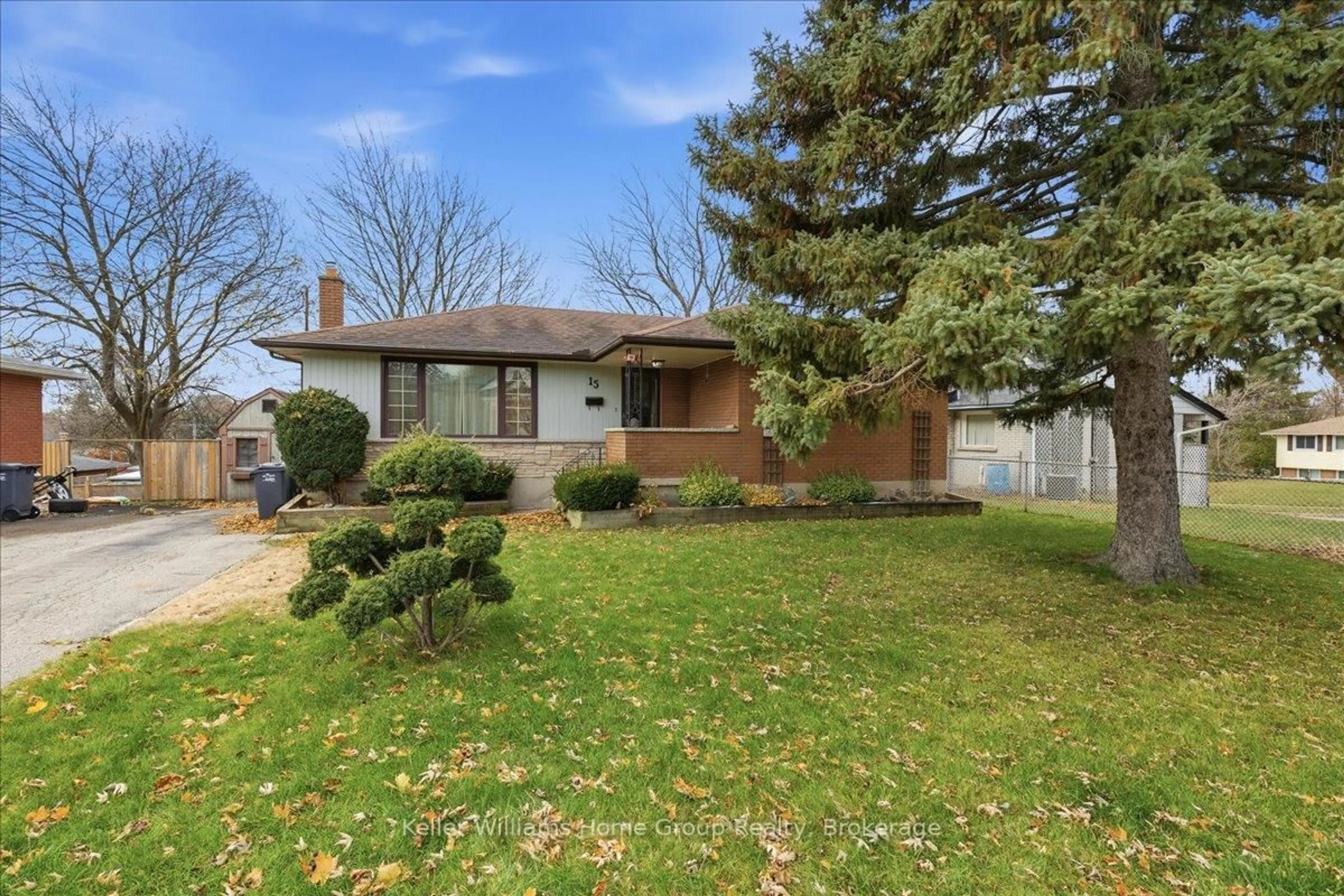 Home with brick exterior material, street for 15 Dakota Dr, Guelph Ontario N1E 1J6