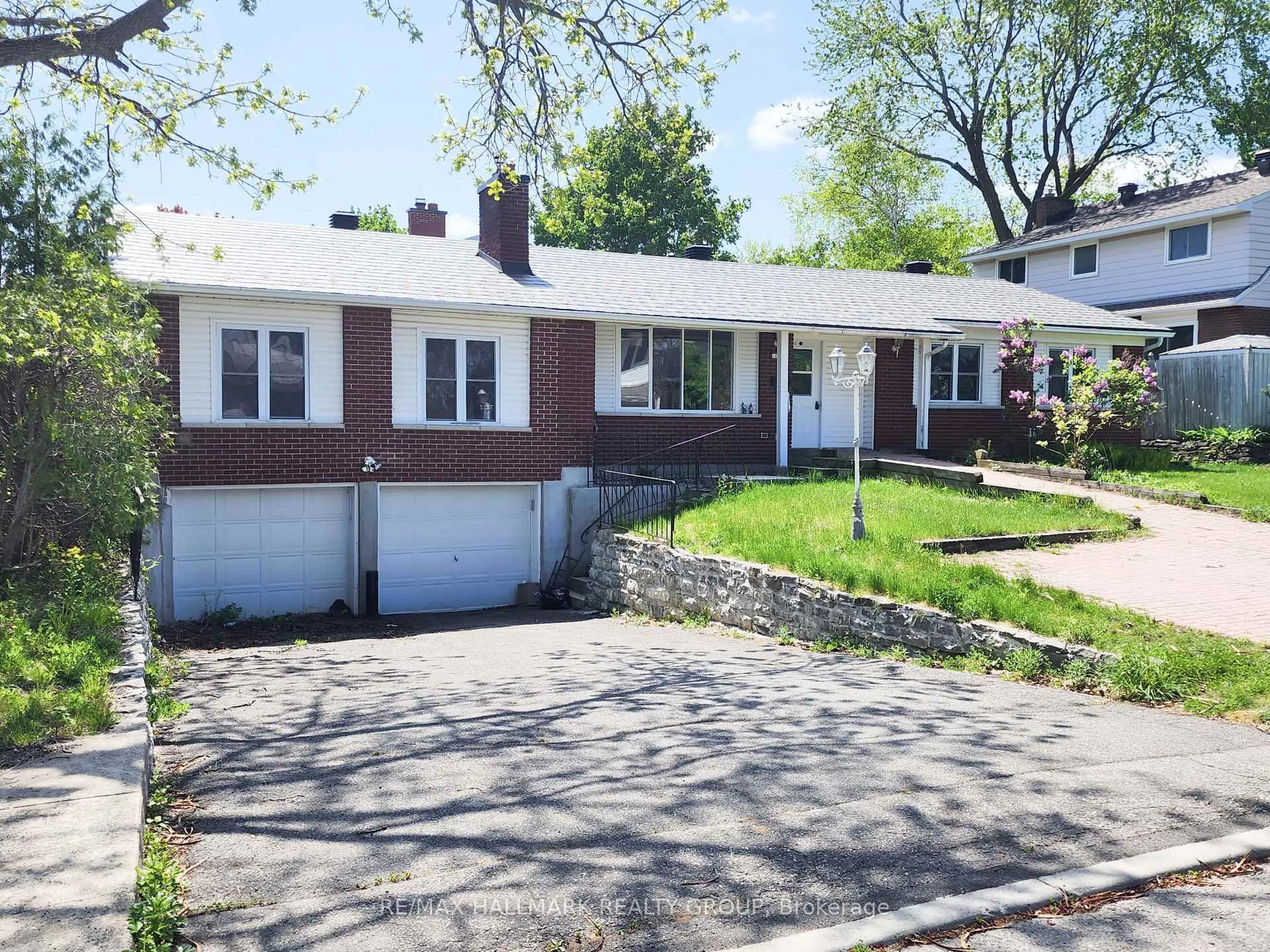 Home with brick exterior material, street for 14 Roberta Cres, Barrhaven Ontario K2J 1G6