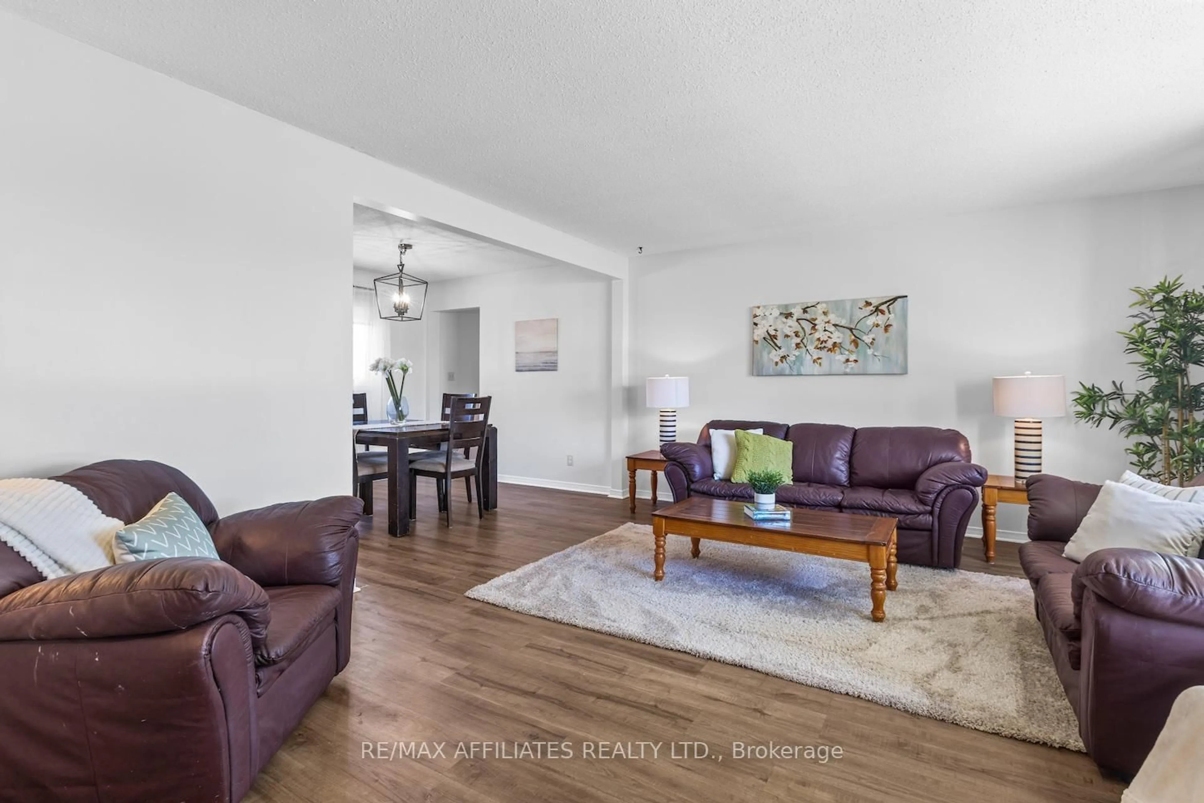 Living room with furniture, wood/laminate floor for 328 Kelly-Jordan Rd, Smiths Falls Ontario K7A 4S7